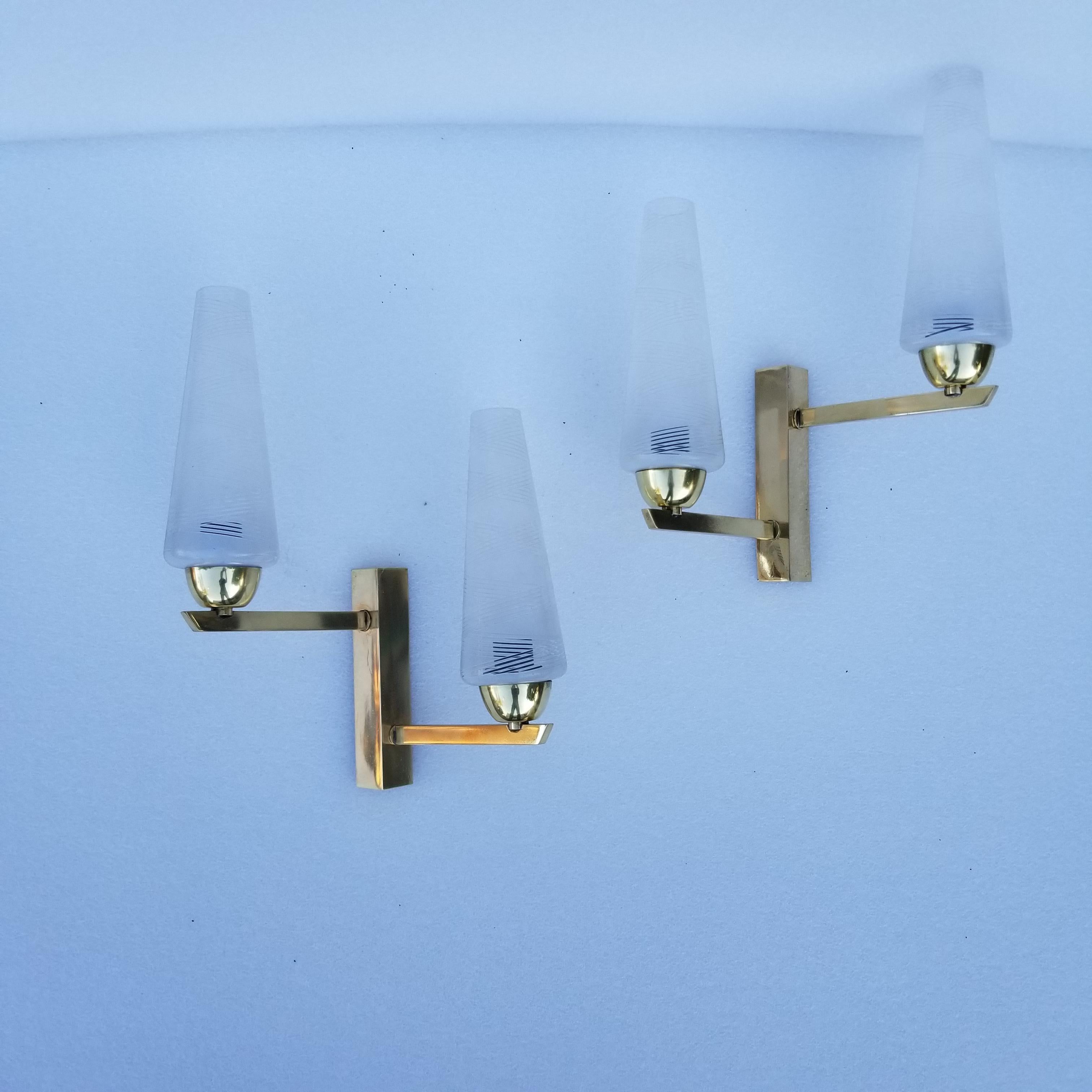 Pair of Maison Lunel sconces. 2 pairs available
2-light, 40 watts max bulb
US rewired, restored.
Have a look at our sconces inventory, more than 200 pairs.