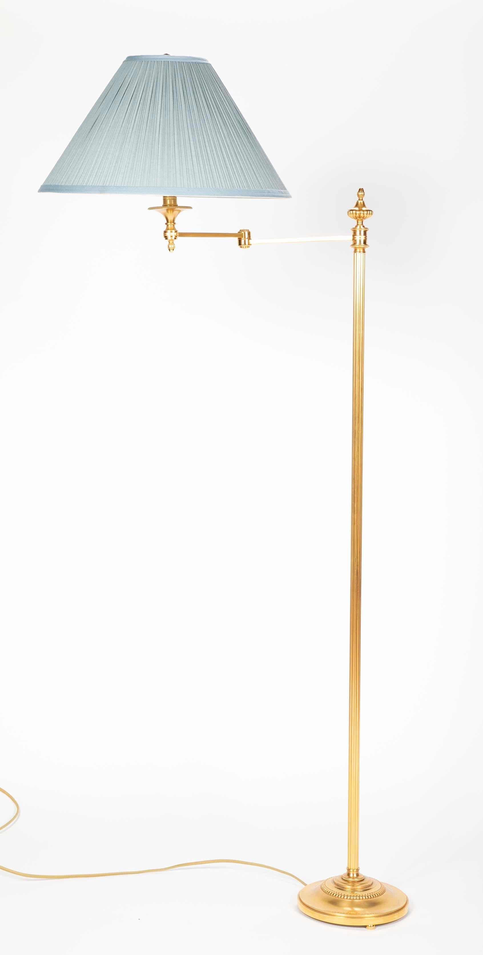 A  gilt bronze, swing-arm floor lamps by Maison Meilleur, France.   Only one floor lamp available.   