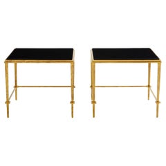 Pareja de mesas auxiliares Maison Ramsay hierro dorado lacado negro 1950