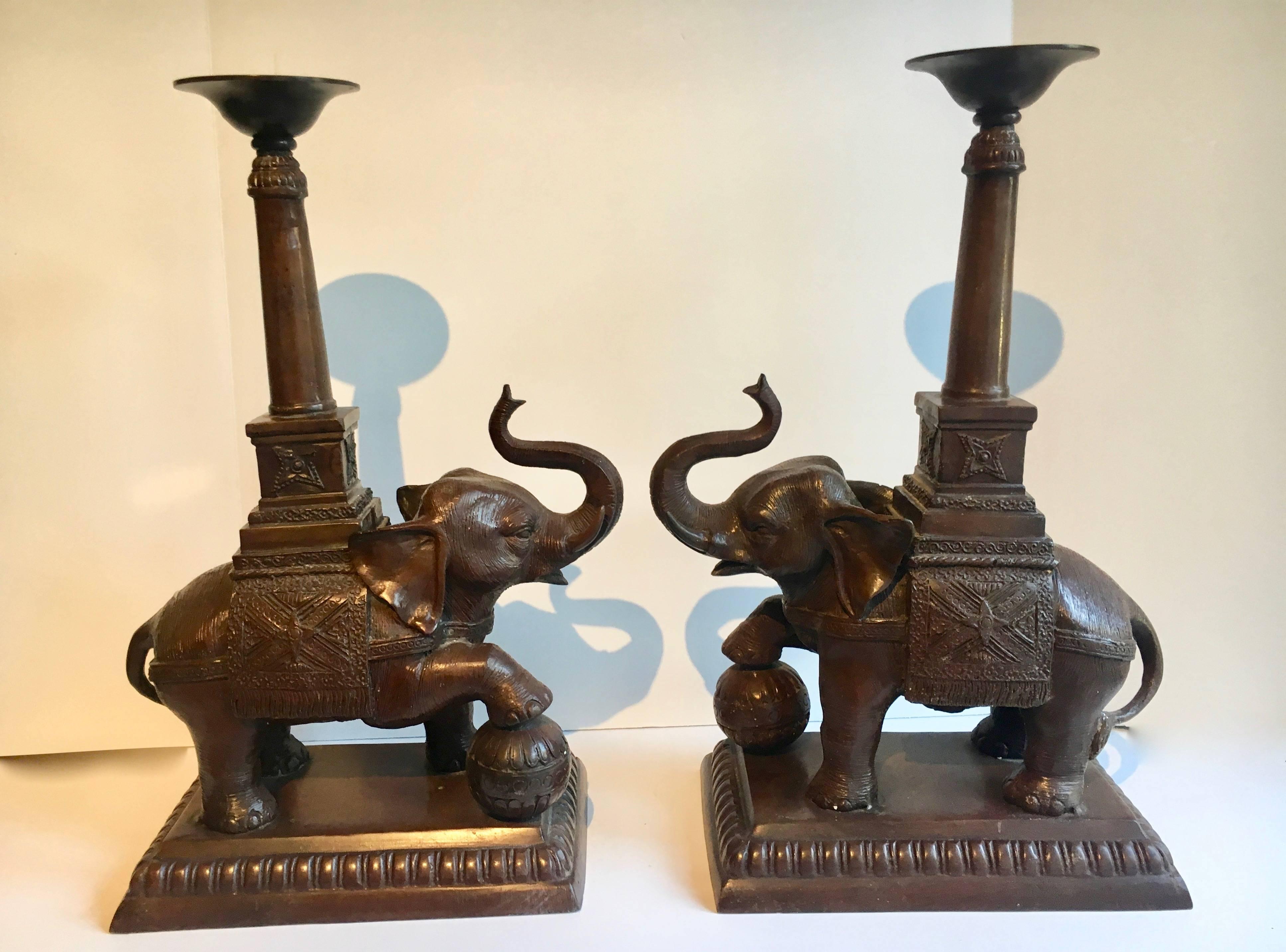 Pair of Maitland Smith elephant candlesticks, a compliment to your dining or console table. Elephants bring good luck and never forget! These pieces are signed indicating they are hand made by Maitland Smith.