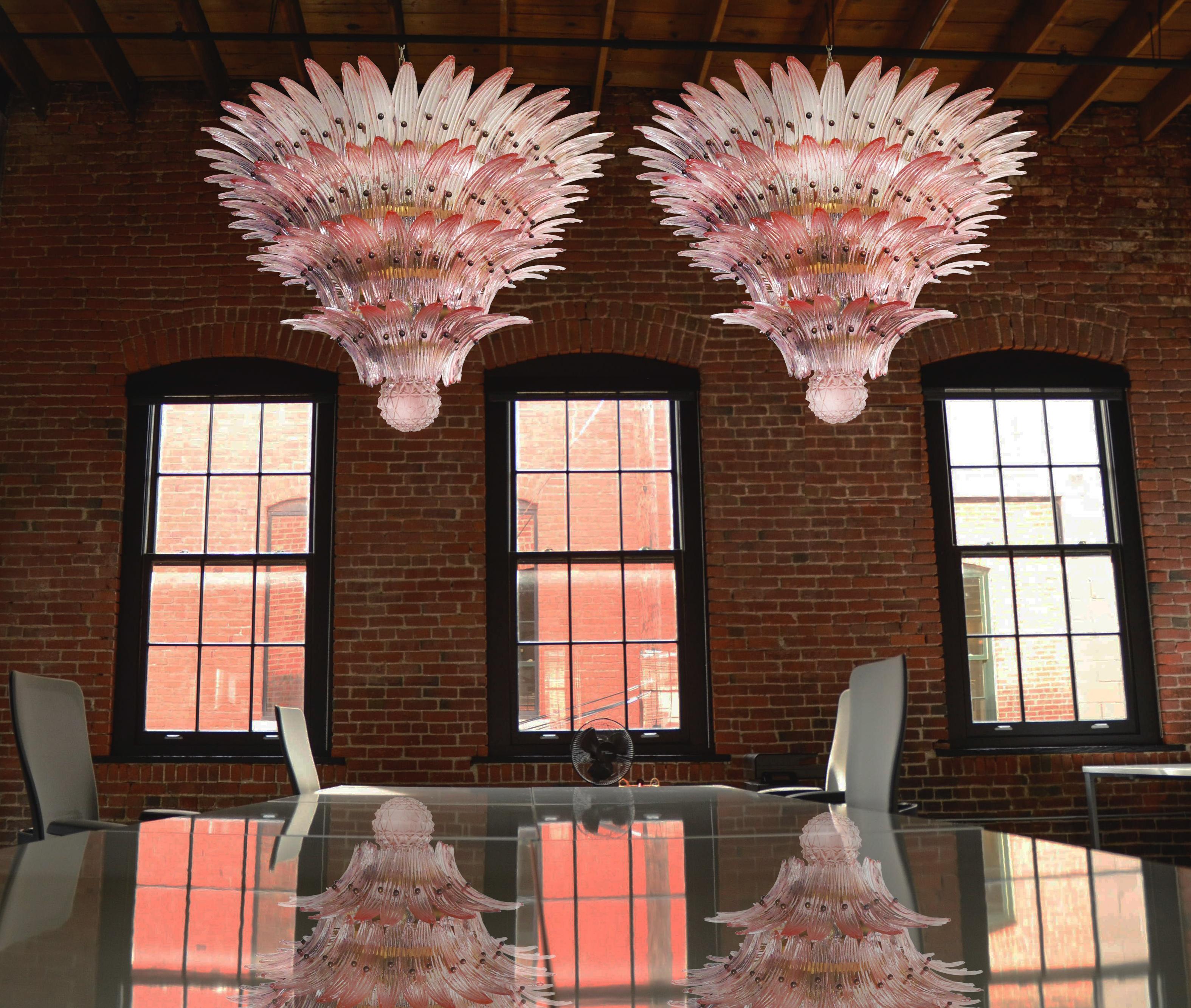 Pair of majestic chandelier ceiling lights, four levels, 163 pink glasses
Palmette ceiling light made by 163 Murano pink glasses in a gold metal frame. Murano blown glass in a traditional way. Structure in gold colored metal.
Period: