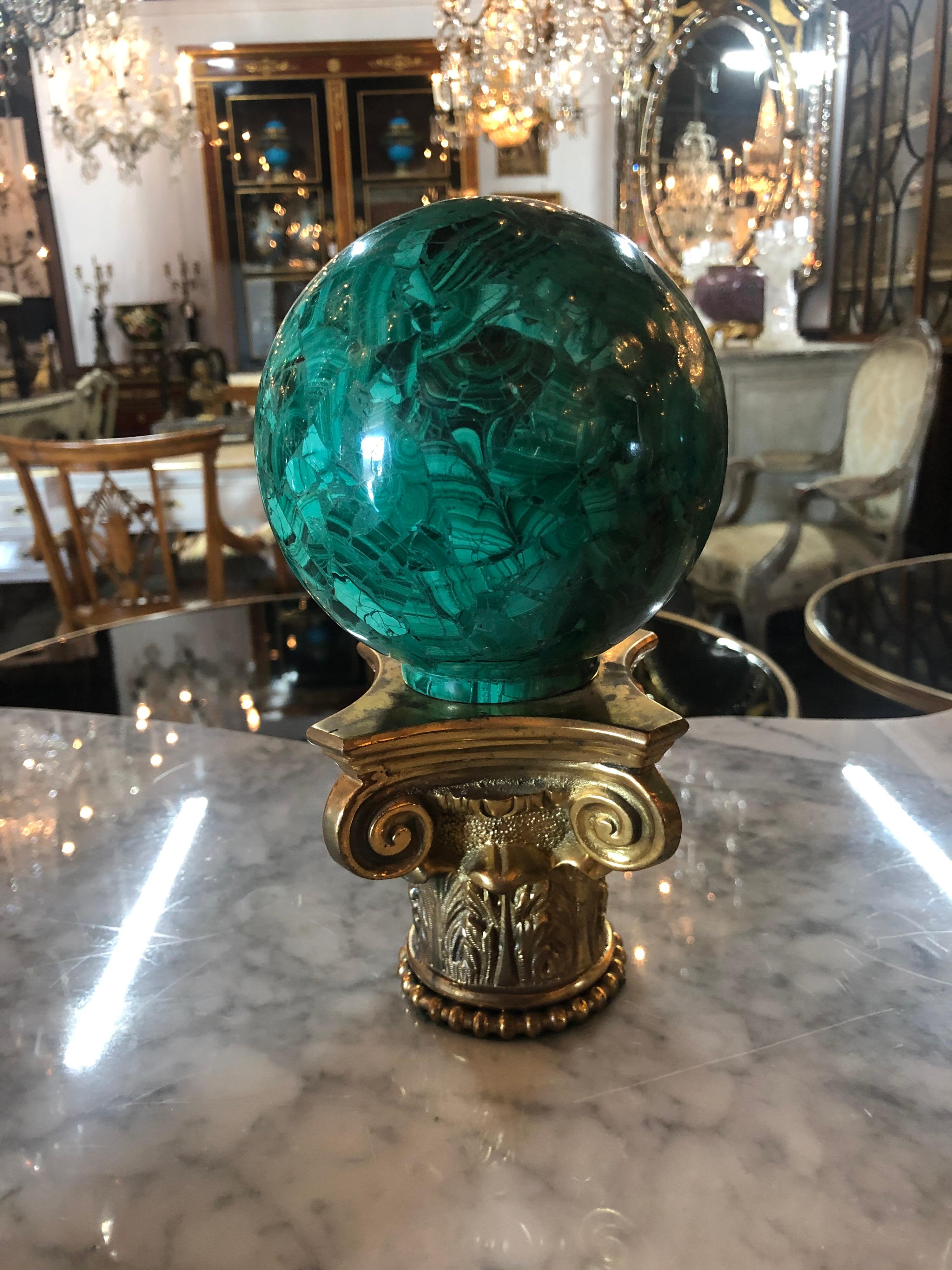 Lovely pair of malachite spheres on a bronze base. Very fine quality!