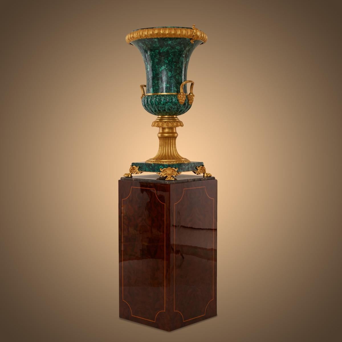 Pair Imperial Russian Malachite and Dore Bronze Hermitage Vases, This malachite vase has a marble base and gilt metal mountings. It is one of a pair exhibited by the Russian Government at the International Exhibition of 1851. Dr. Ludmila Budrina of