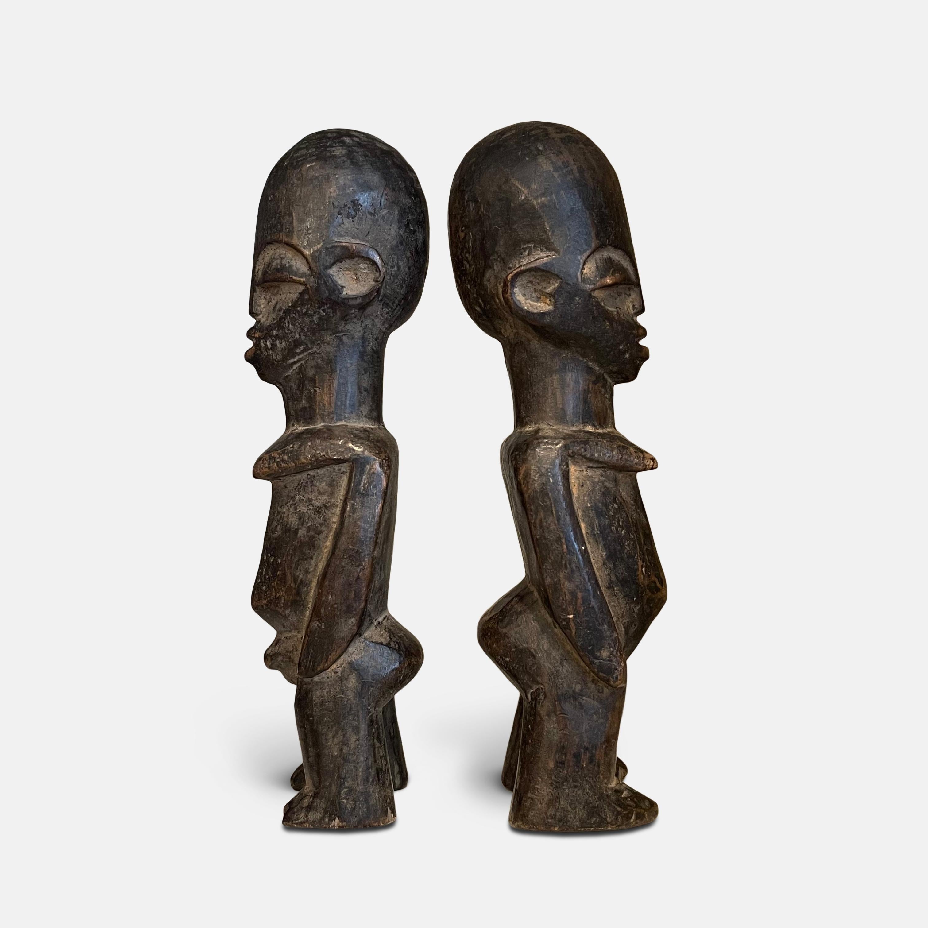 Hand-Carved Pair of Male and Female Lobi Bateba Statues, Burkina Faso, Early 20th Century