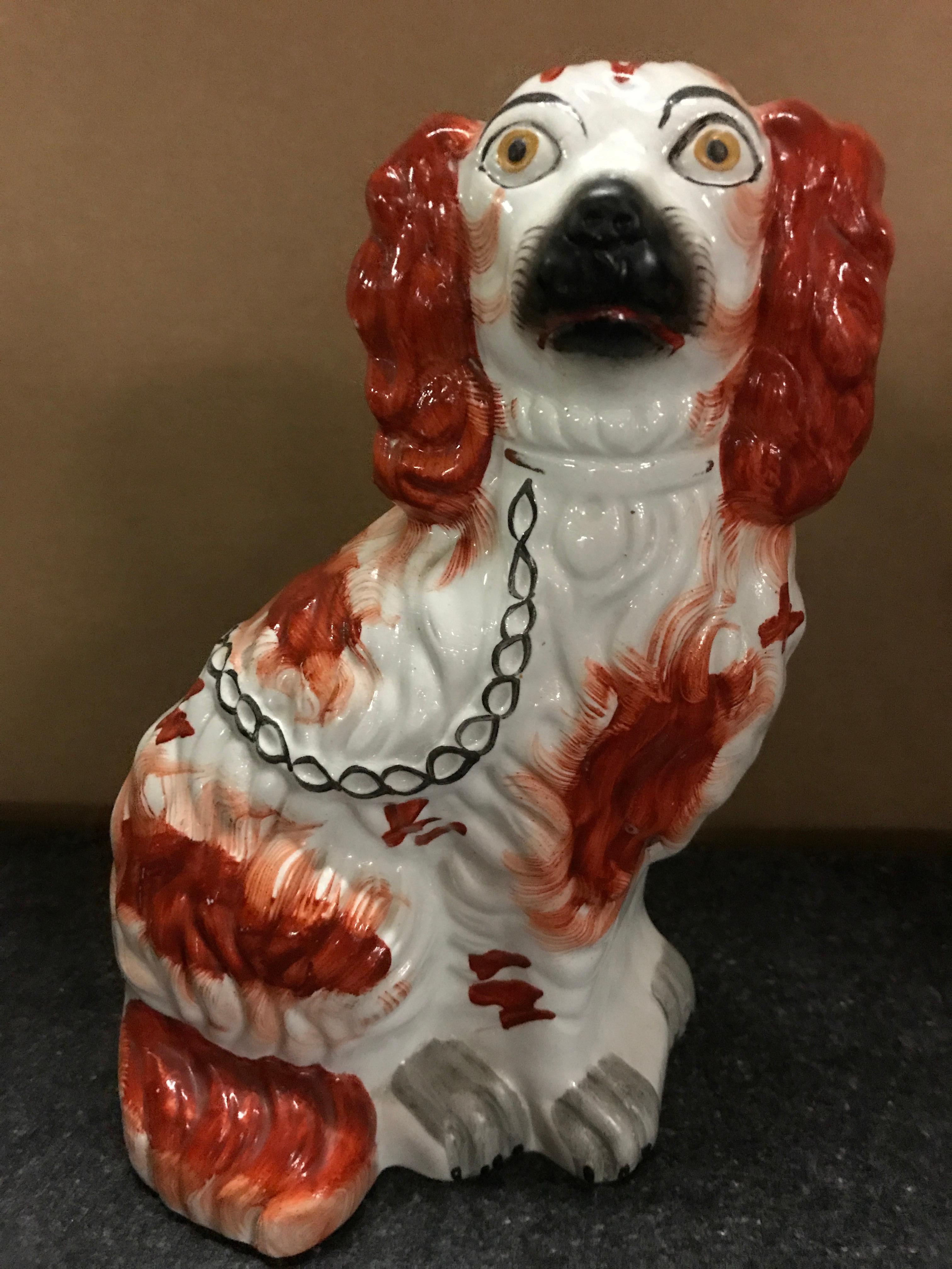 Hand-Painted Pair of Male and Female Staffordshire England Red Seated Spaniel Dogs