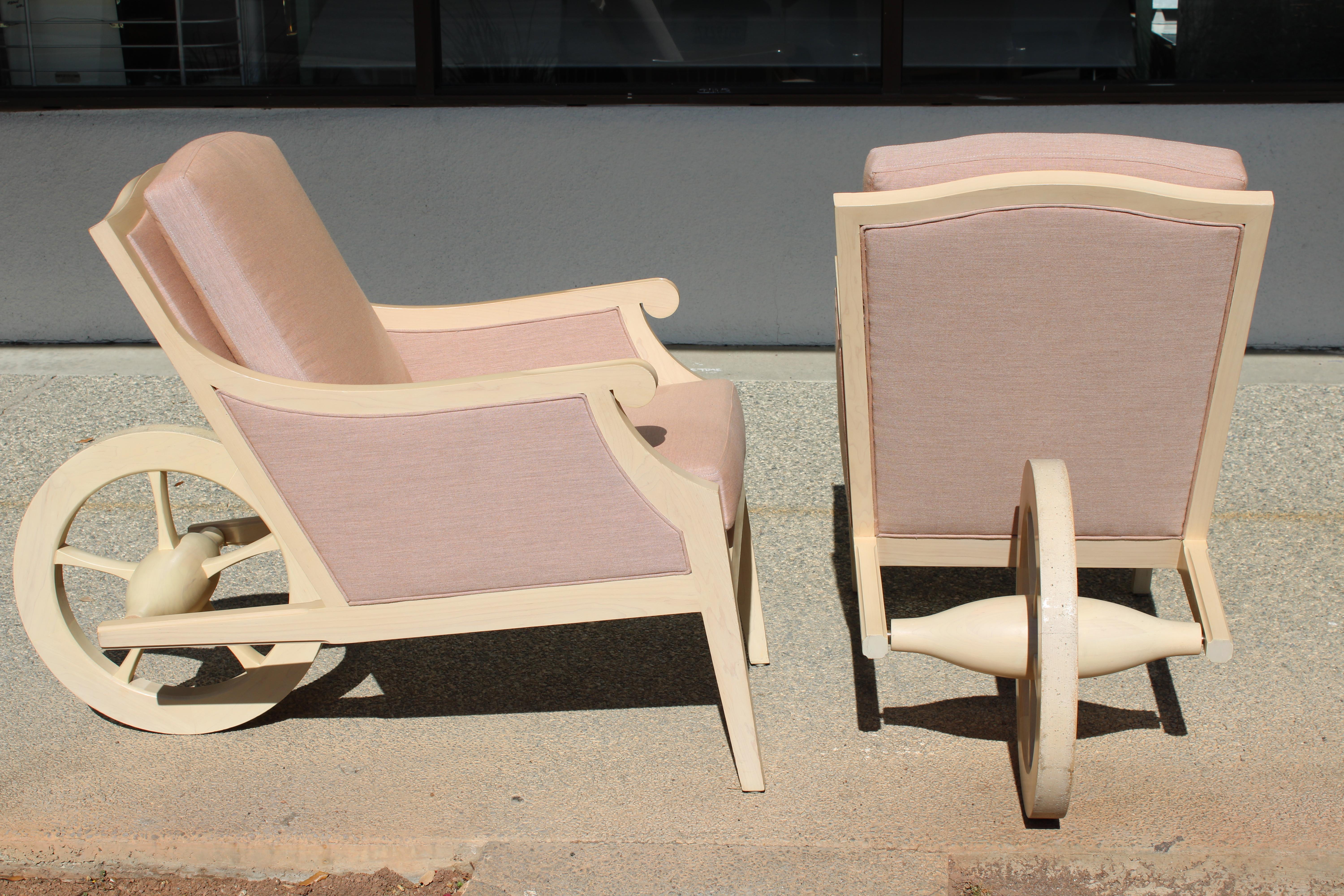 Pair of Man Ray lounge chairs designed by Philippe Starck for the Clift Royal Sonesta Hotel, San Francisco, CA., circa 2000. Chairs have been professionally refinished and reupholstered in Sunbrella fabric. Chairs measures 22.5