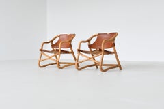 Pair of “Manilla” lounge chairs in cognac leather Denmark 1960