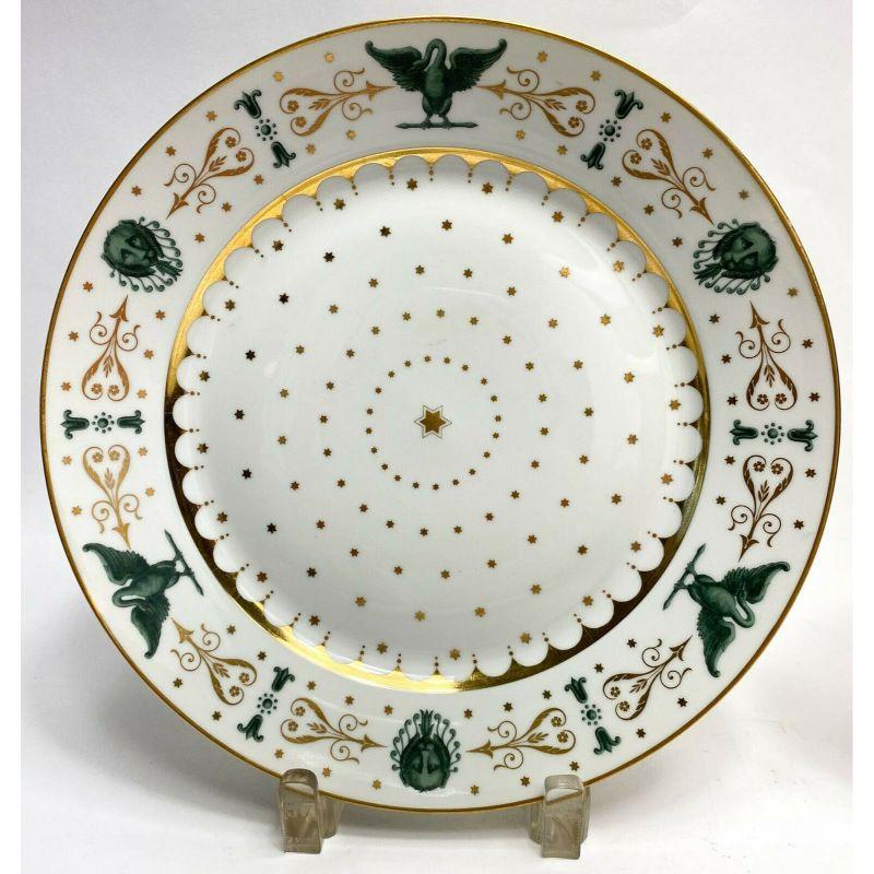 Pair of Manufacture de Sevres porcelain cabinet plates Empire Style, 1959.

Pair cabinet plates decorated with gold & green stars, swans and lions. Various incised letters and number to underside of porcelain. 

Additional Information:
Time