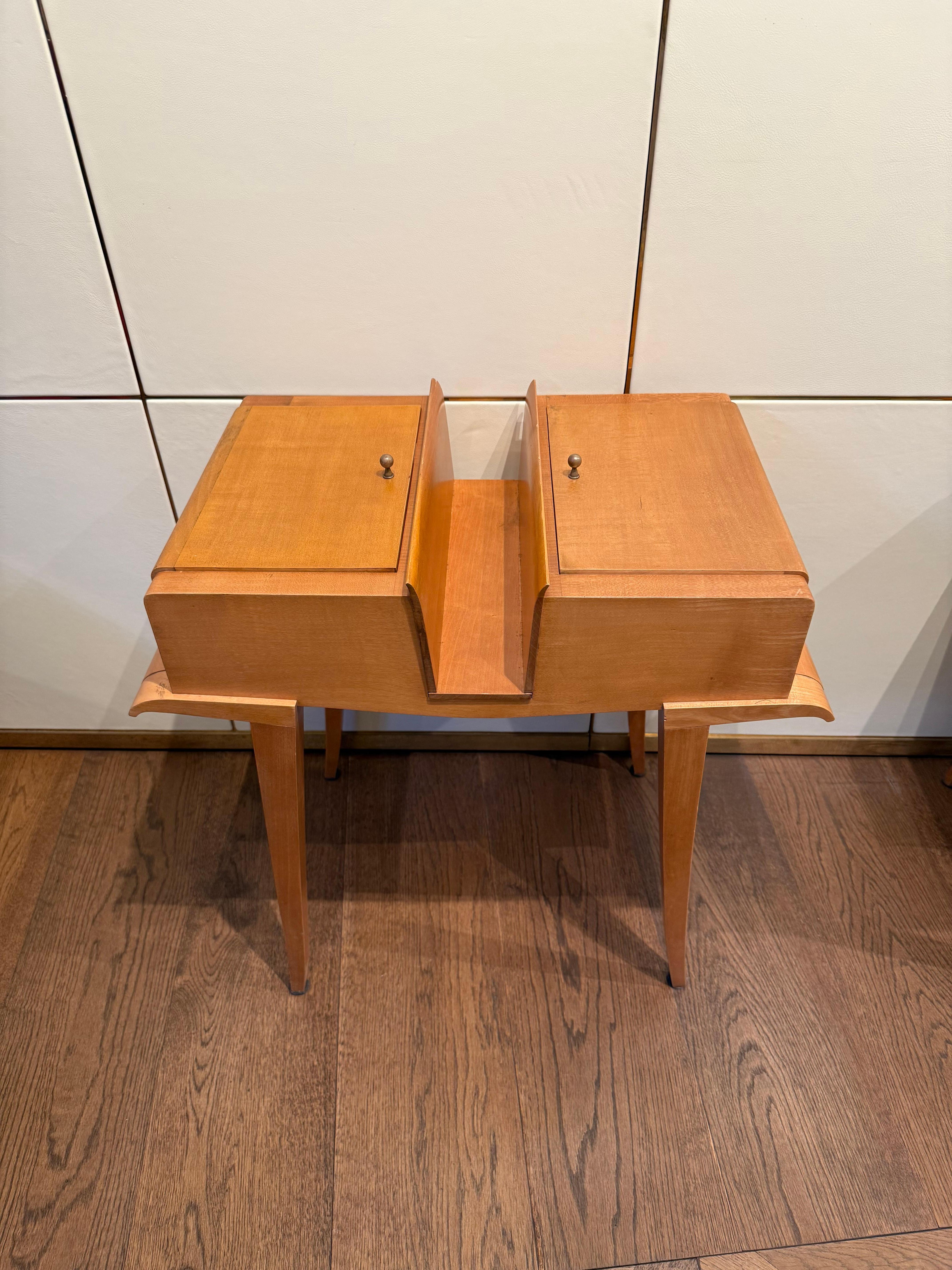 An elegant pair of Mid Century modern bedside tables by renowned French designer Maxime Old (1910–1991) showcasing the refined craftsmanship and modernist sensibility that defined his early career. The pair was manufactured in France circa 1940 and