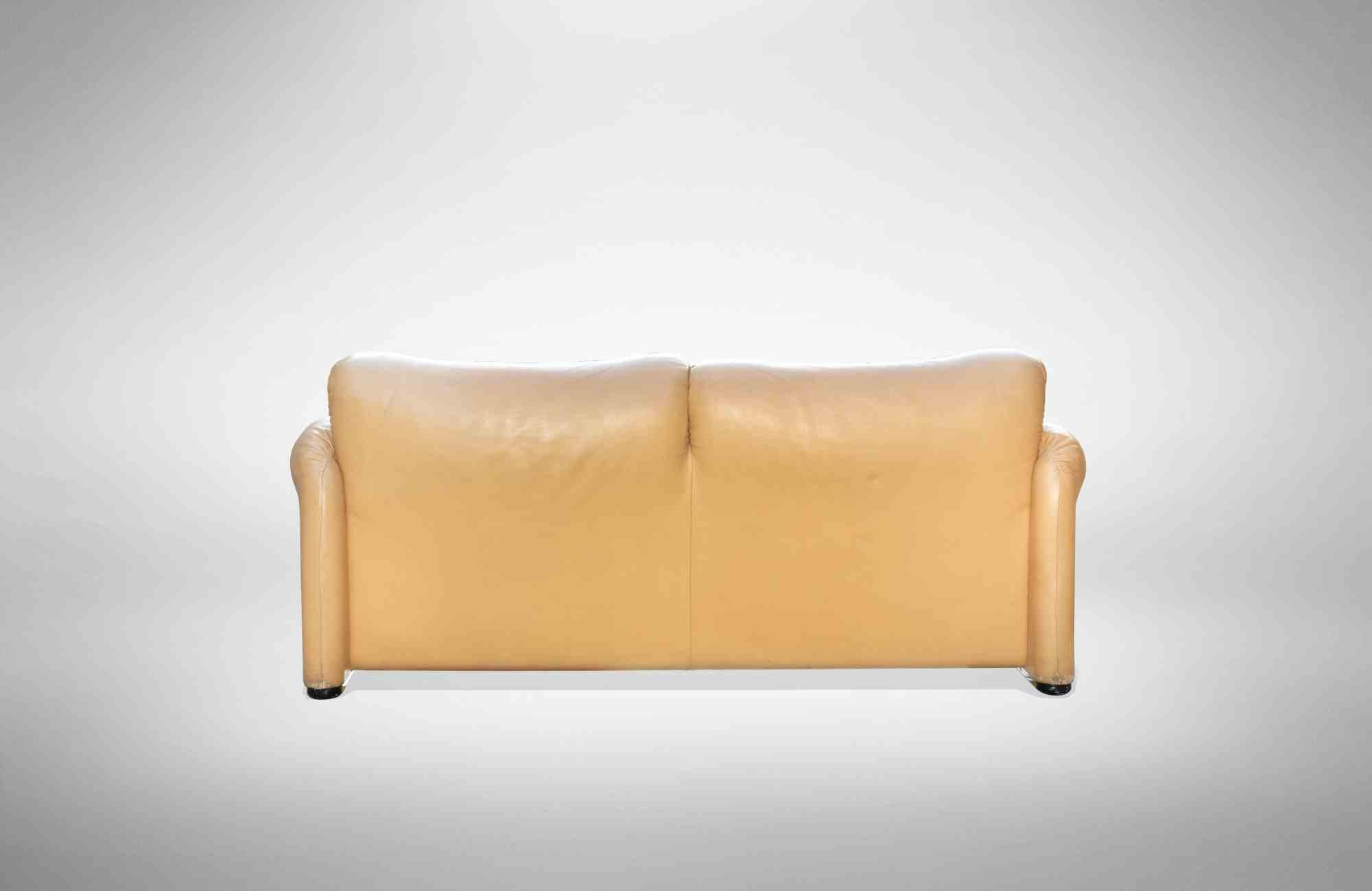 Pair of Maralunga sofas is an original and iconic design item designed by Vico Magistretti for Cassina.

Yellow leather sofa.

Dimensions:
Seatback height: 70 cm (close) - 100 cm (open)
Lenght: 165 cm 
Seat height: 42

Maralunga is one of