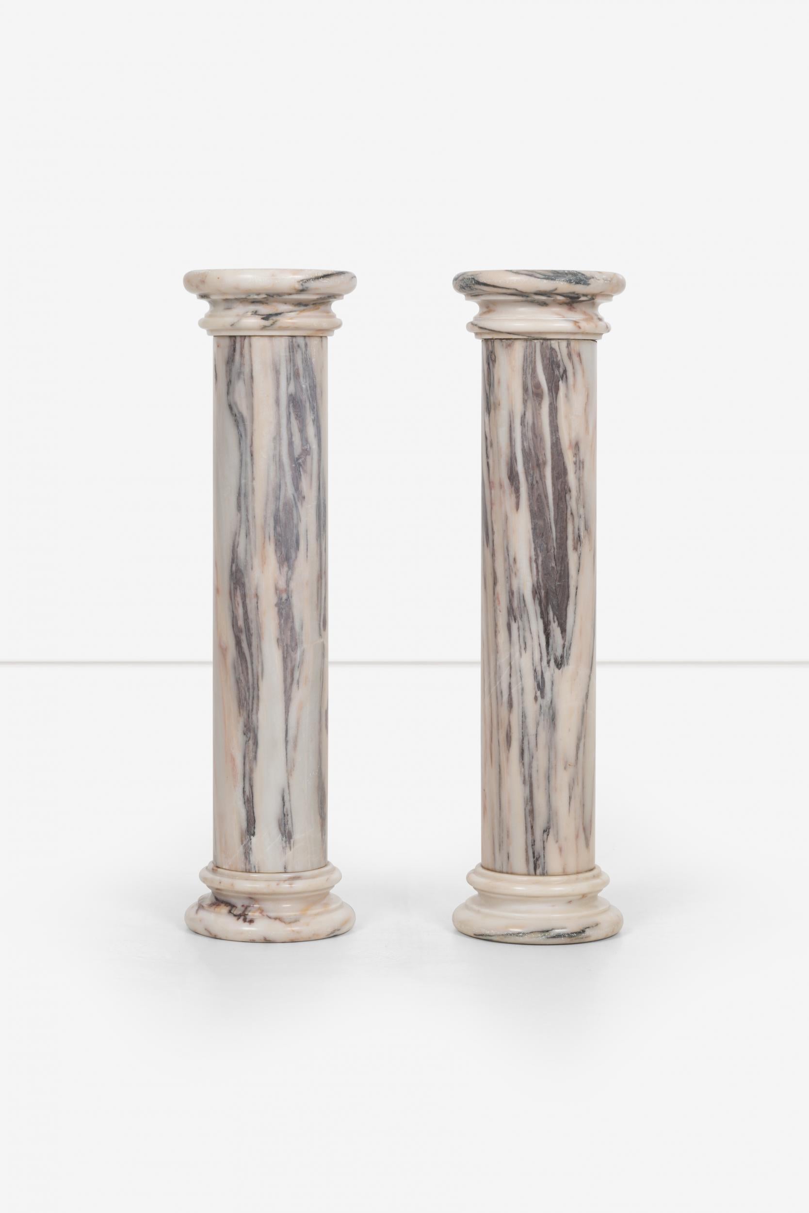 Pair of marble architectural display columns in Calacatta pink quarried in Italy.

Measures: Height: 31.5