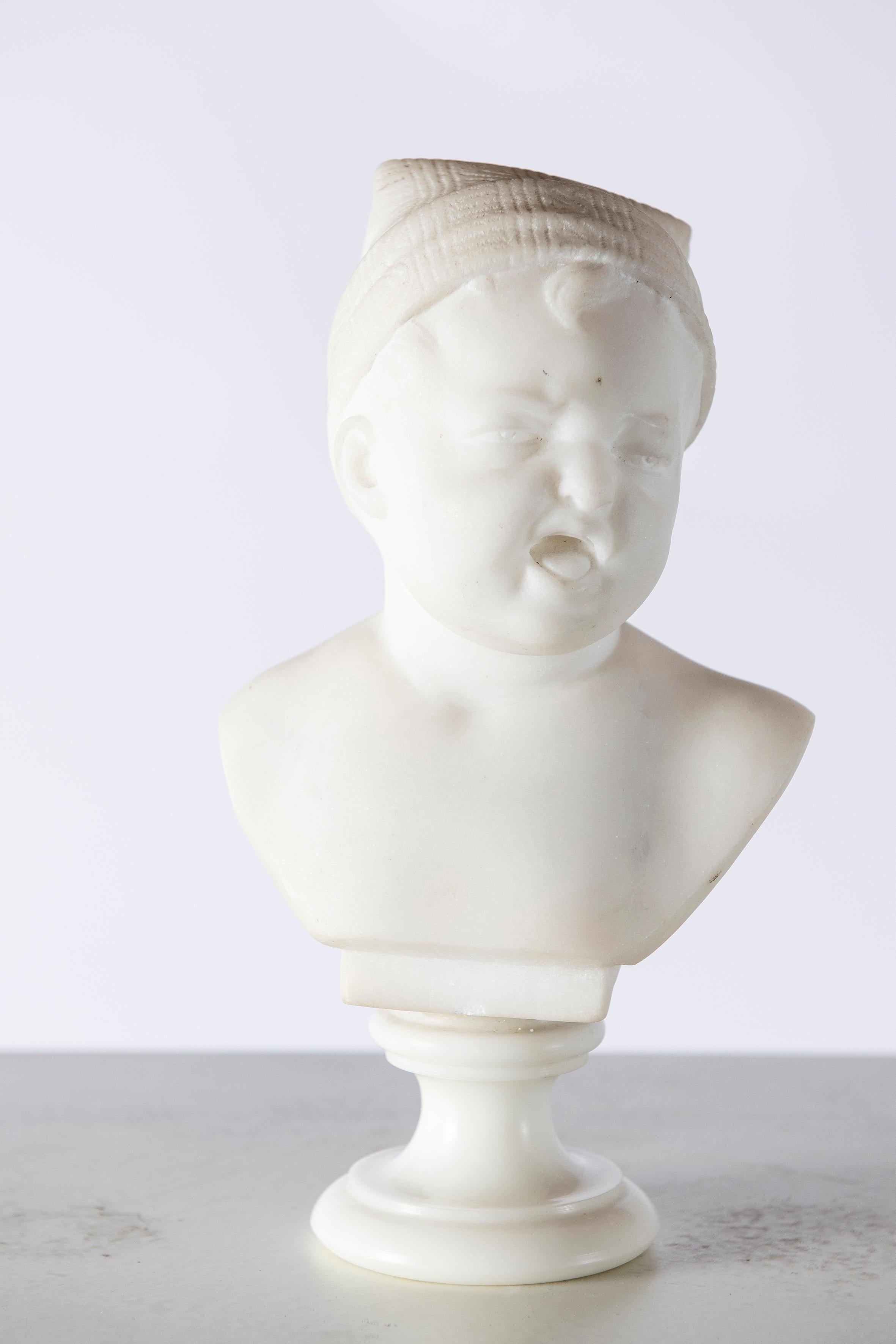 Pair of marble baby busts, Italy, circa 1890.