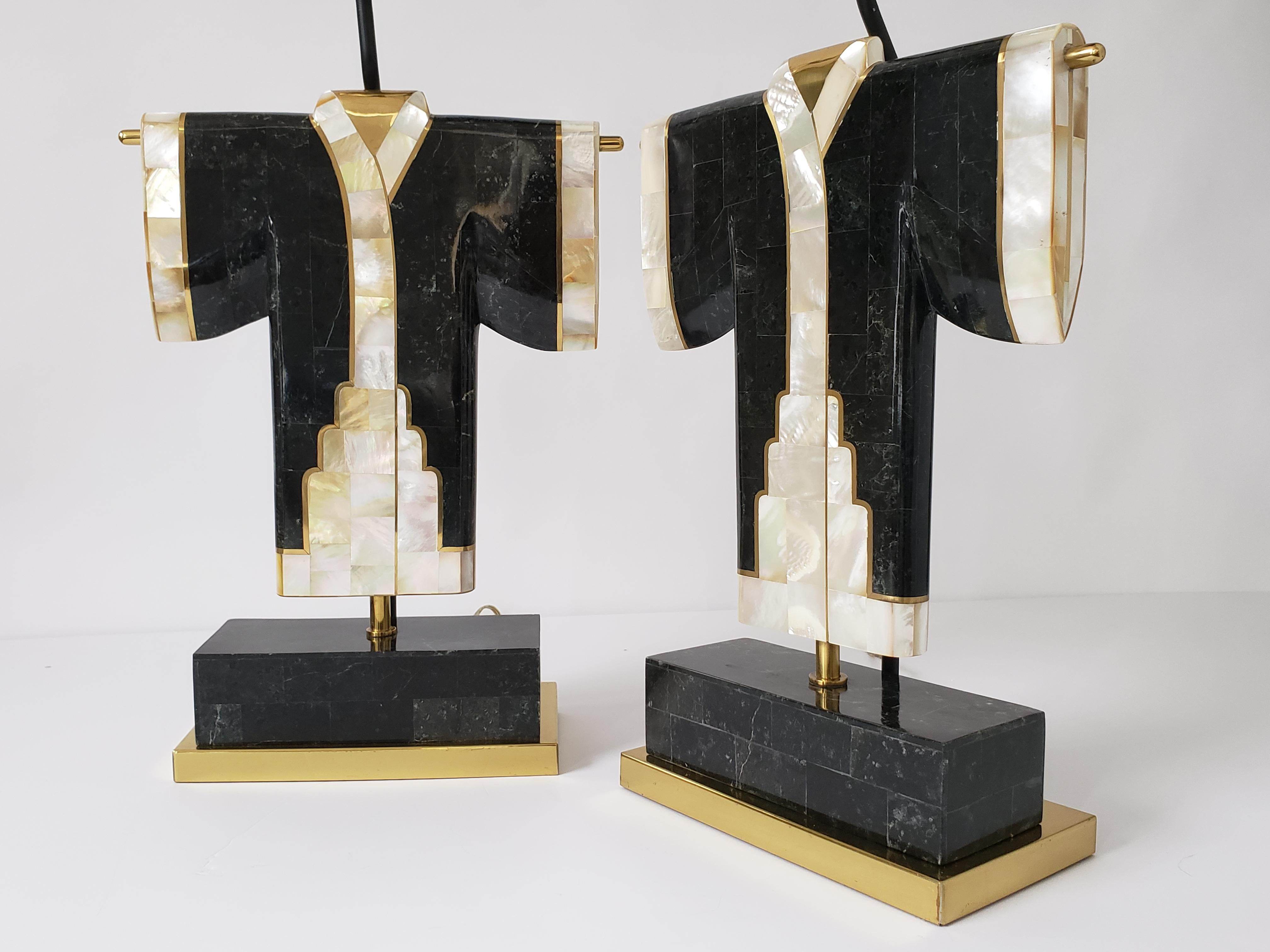 Rare pair of Japanese kimono table lamp from Maitland Smith . 

Well executed lighting art piece with prime quality material and superb craftsmanship. 

Selected dark green veined marble, fine brass and capiz shell. 

One regular E26 socket