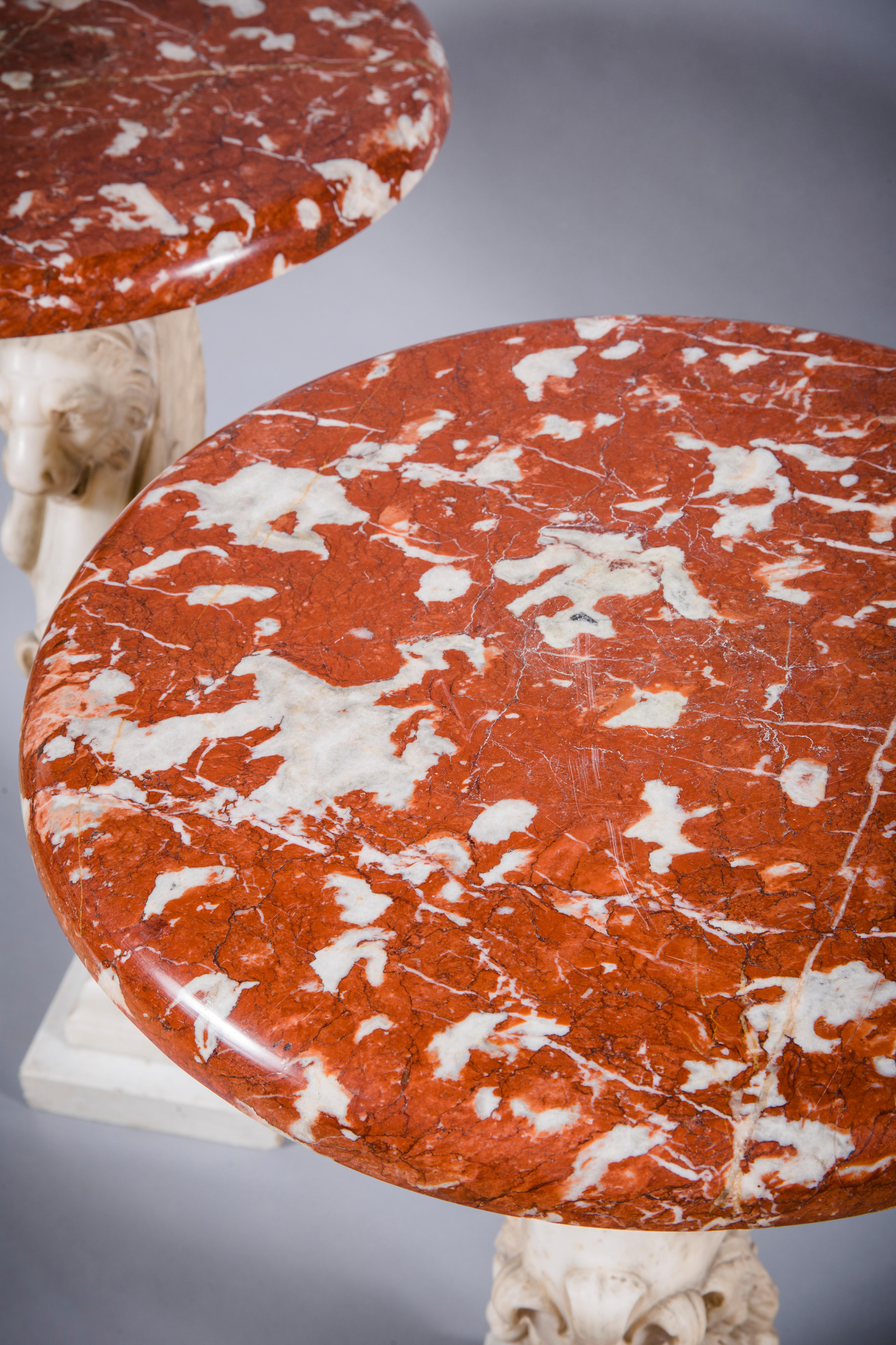 Pair of carved trapezophorus form side tables
carved white marble base in the form of a lion with round red marble tops
Italian, 19th Century
Measures: height 34 in; diameter 19 in.

NMA Inv. 582.