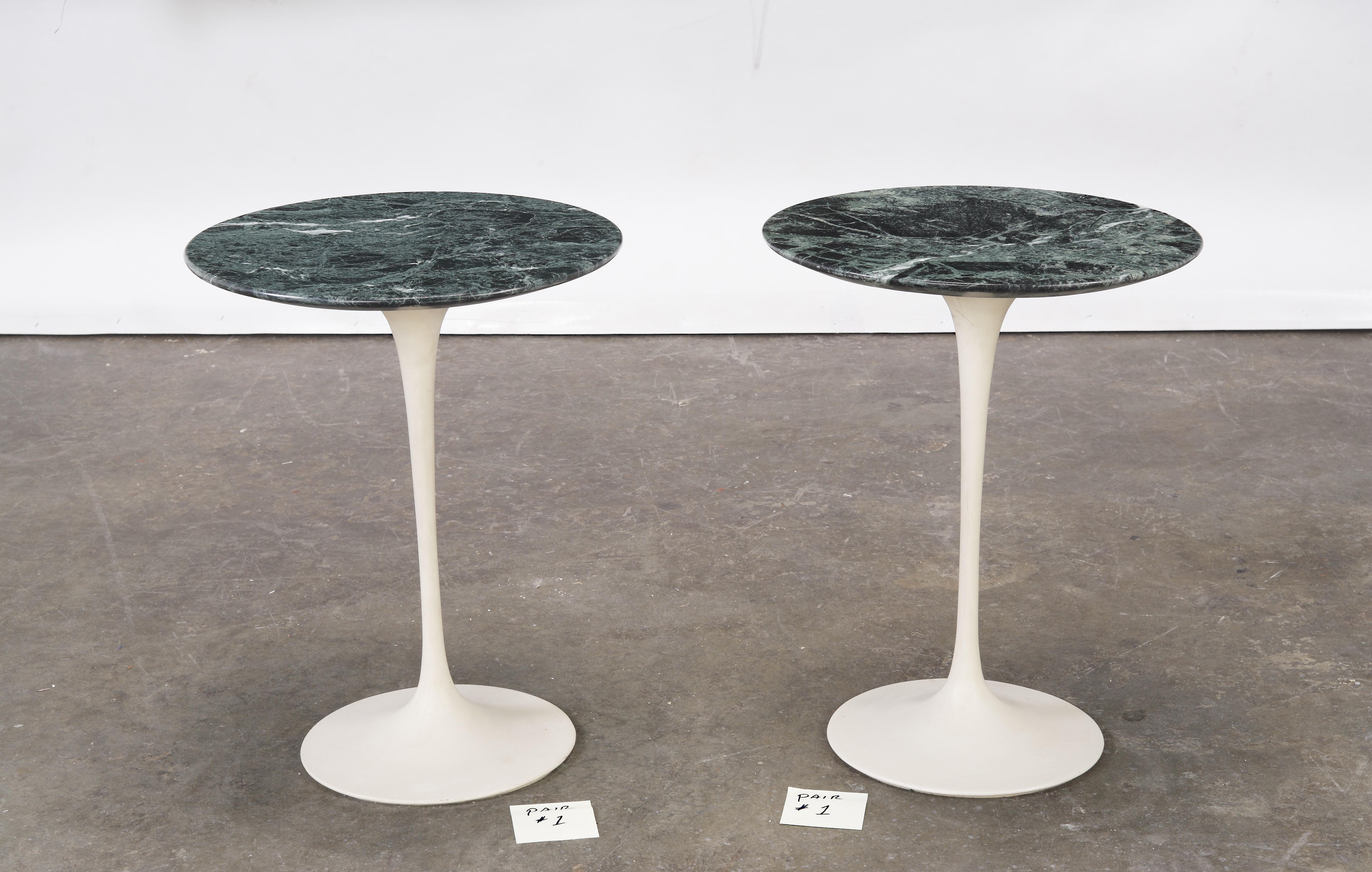 A pair of marble Eero Saarinen Tulip tables, made in the USA by Knoll, 1970s. Makers label to the underside. Stunning Verdi Alpi marble, enameled steel, enameled aluminum. Good vintage condition with only minor signs of use and wear relative to