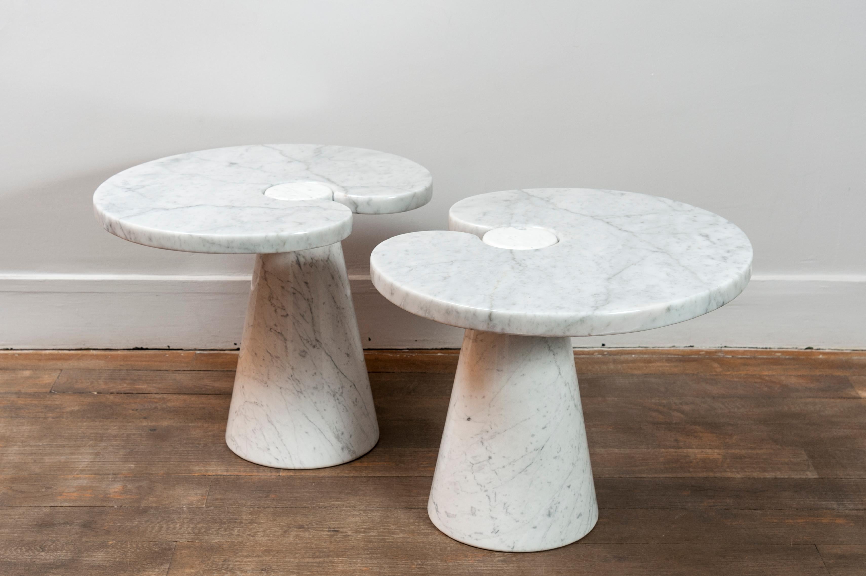 Pair of side tables from Mangiarotti’s Eros series.
Carrara marble
The marble-top held by a marble conic pedestal.
Design: Angelo Mangiarotti,
Skipper edition,
Italy, circa 1970.

Measures: Height: 41 cm/16.1 in. 
Width: 54 cm/21.3