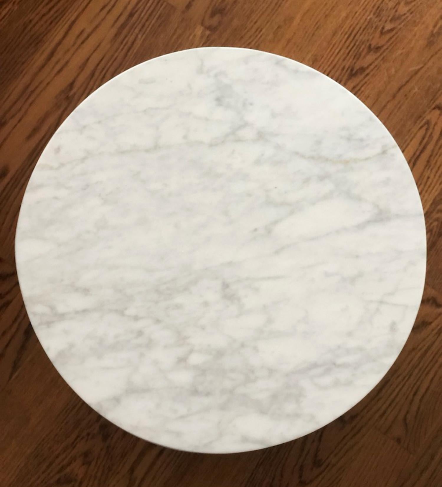 Handcrafted from slabs of marble on a sturdy wooden frame
Thick, overhanging top is set on a low, inset base to create a floating effect
Hidden casters allow ease of placement. Casters are not removable and do not lock.
Variations in the natural