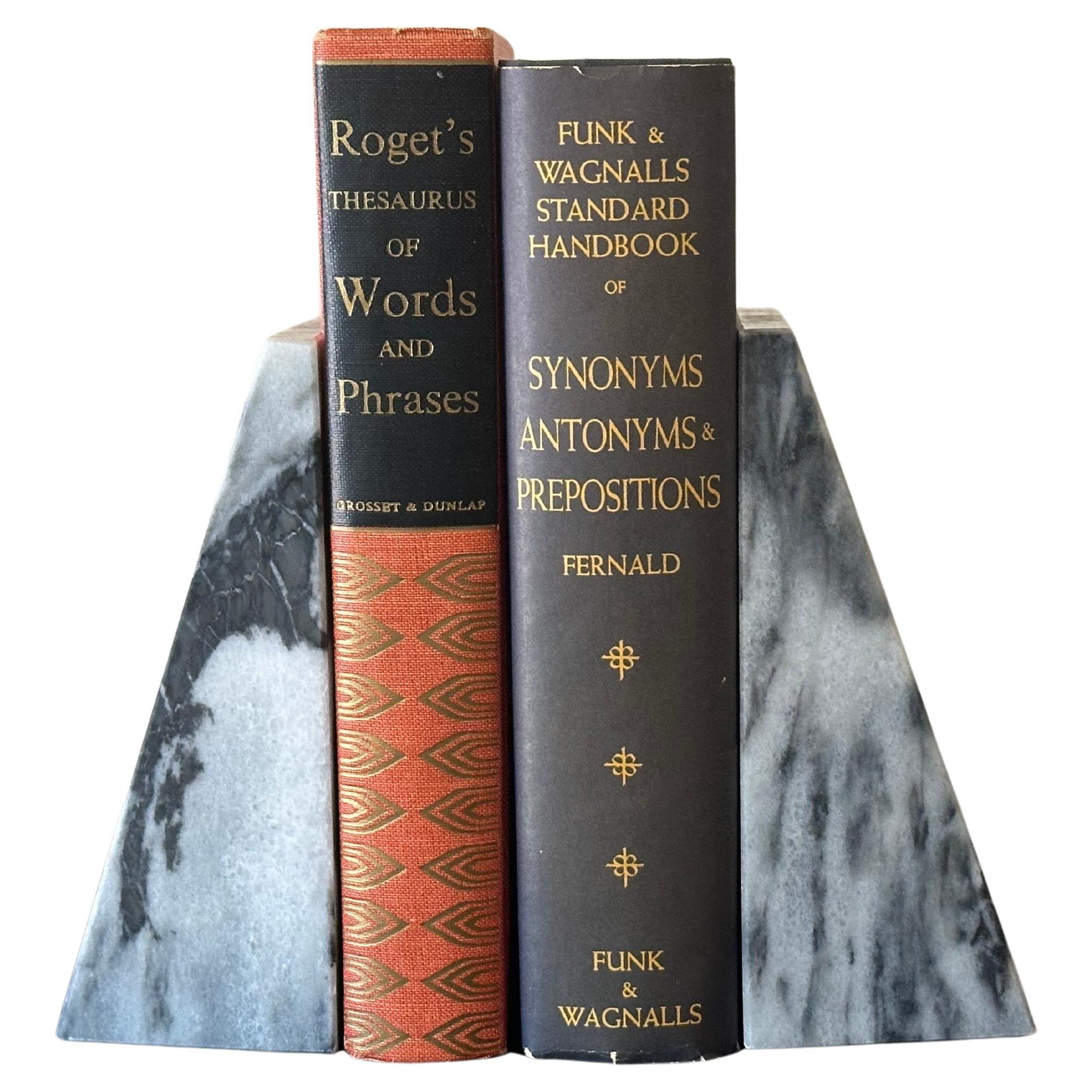 Pair of Marble Post-Modern Black/White/Gray Triangular Bookends. Fabulous pair of marble post-modern triangular bookends, circa 1980s. They are in very good vintage condition with no chips, cracks and only very light scratching on the bottom. Nice