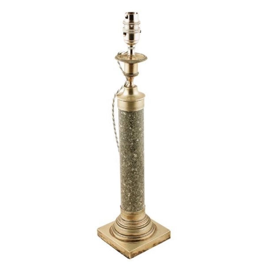 A pair of late 19th century marble and silver plated candlestick lamps.

The lamps have silver plated square bases and candle holders with coloured marble pillars, one rouge and the other grey.

The candle holders have been converted to house