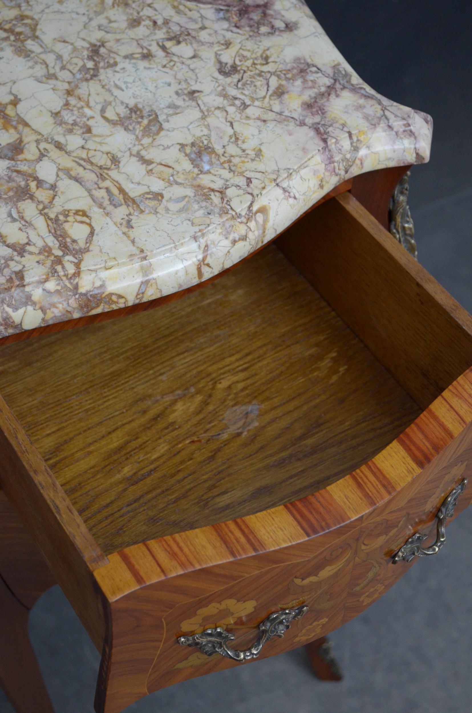 marble topped bedside tables