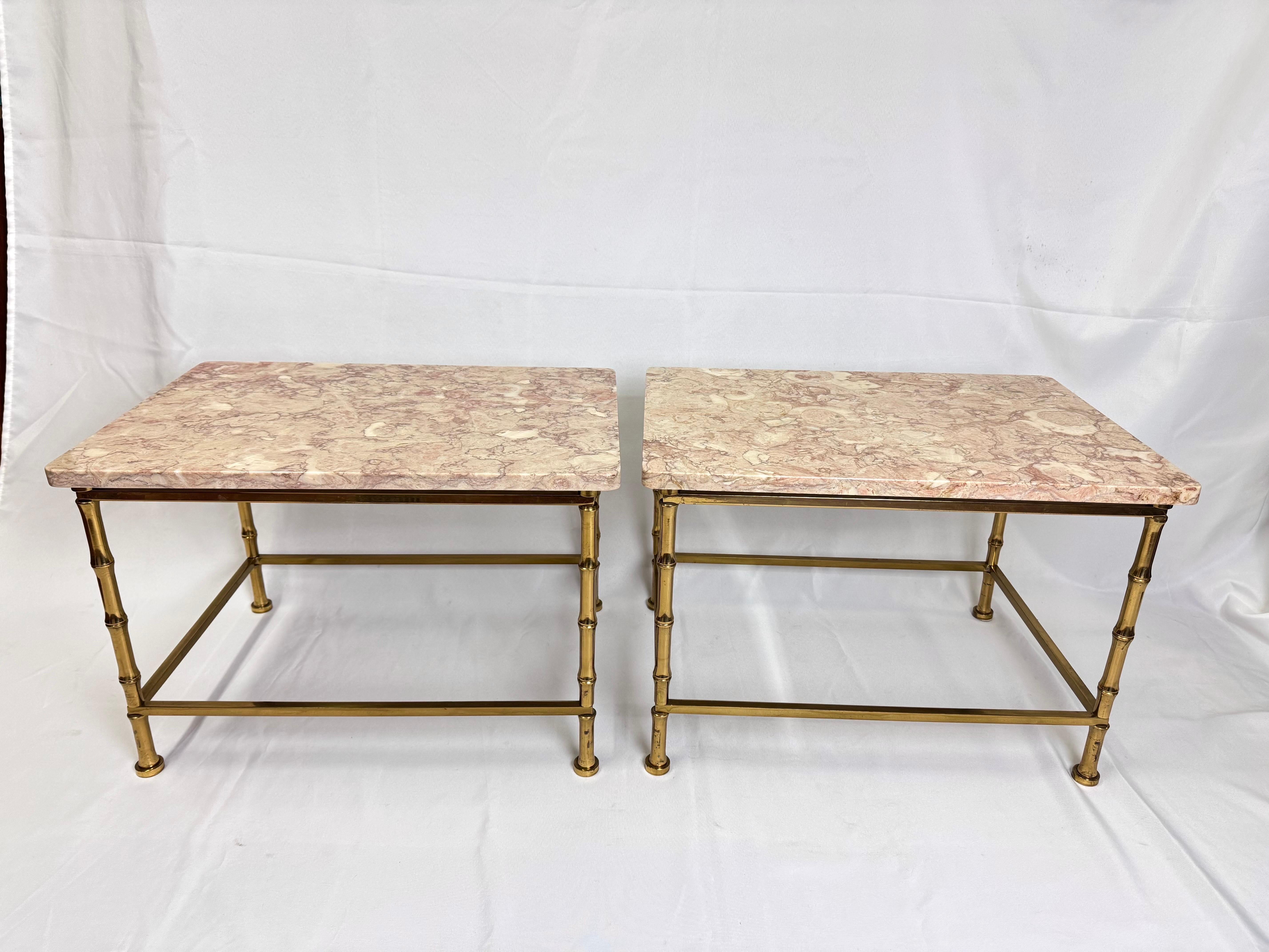 Pair of Marble Topped Brass Bamboo End Tables. These tables possess an
Elegant sophistication . Brass bamboo legs upon a pink and white marble table top. Price is for the pair. 
