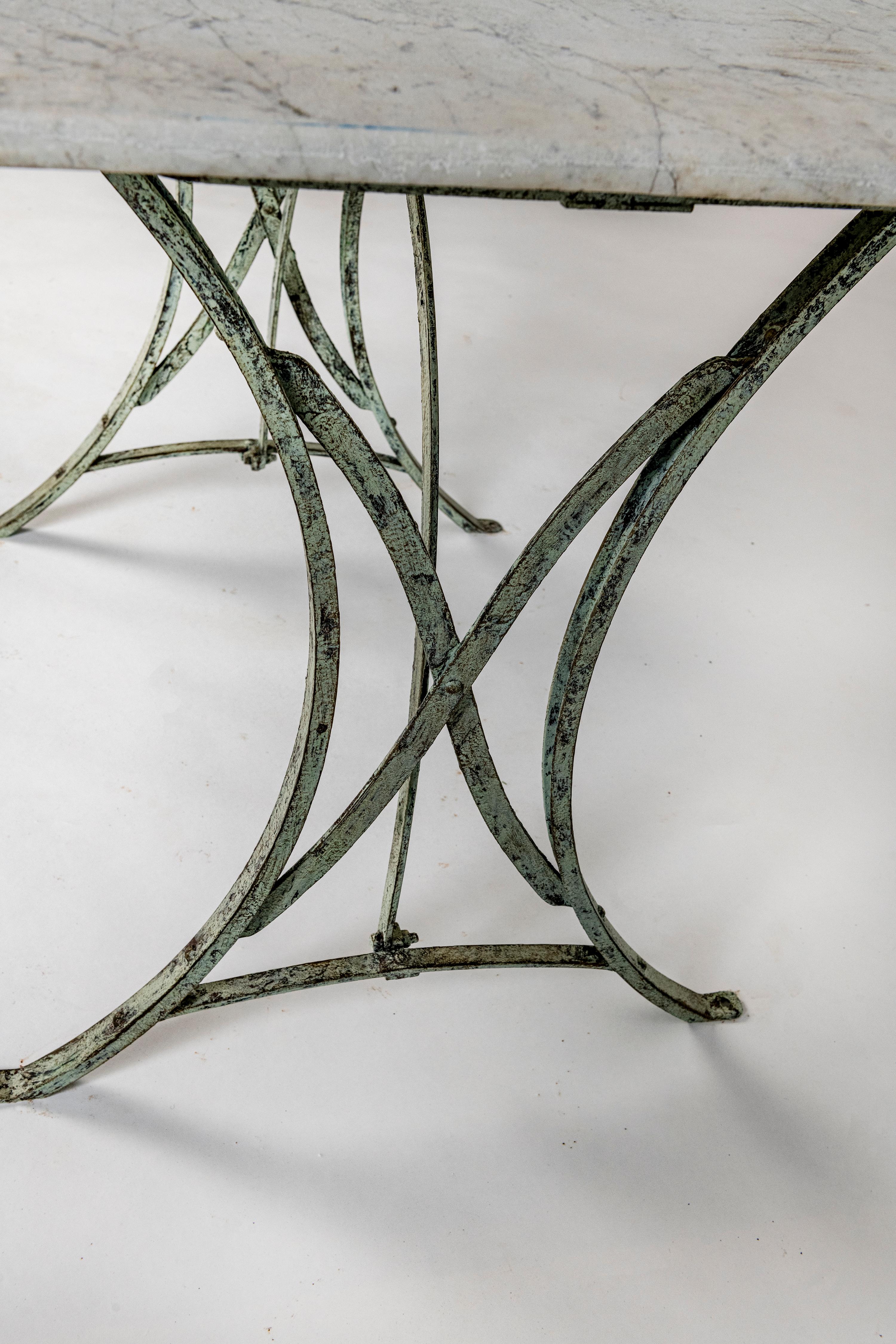 Wrought Iron Pair of Marble Topped Conservatory Table sold separately, inside or outside use. For Sale