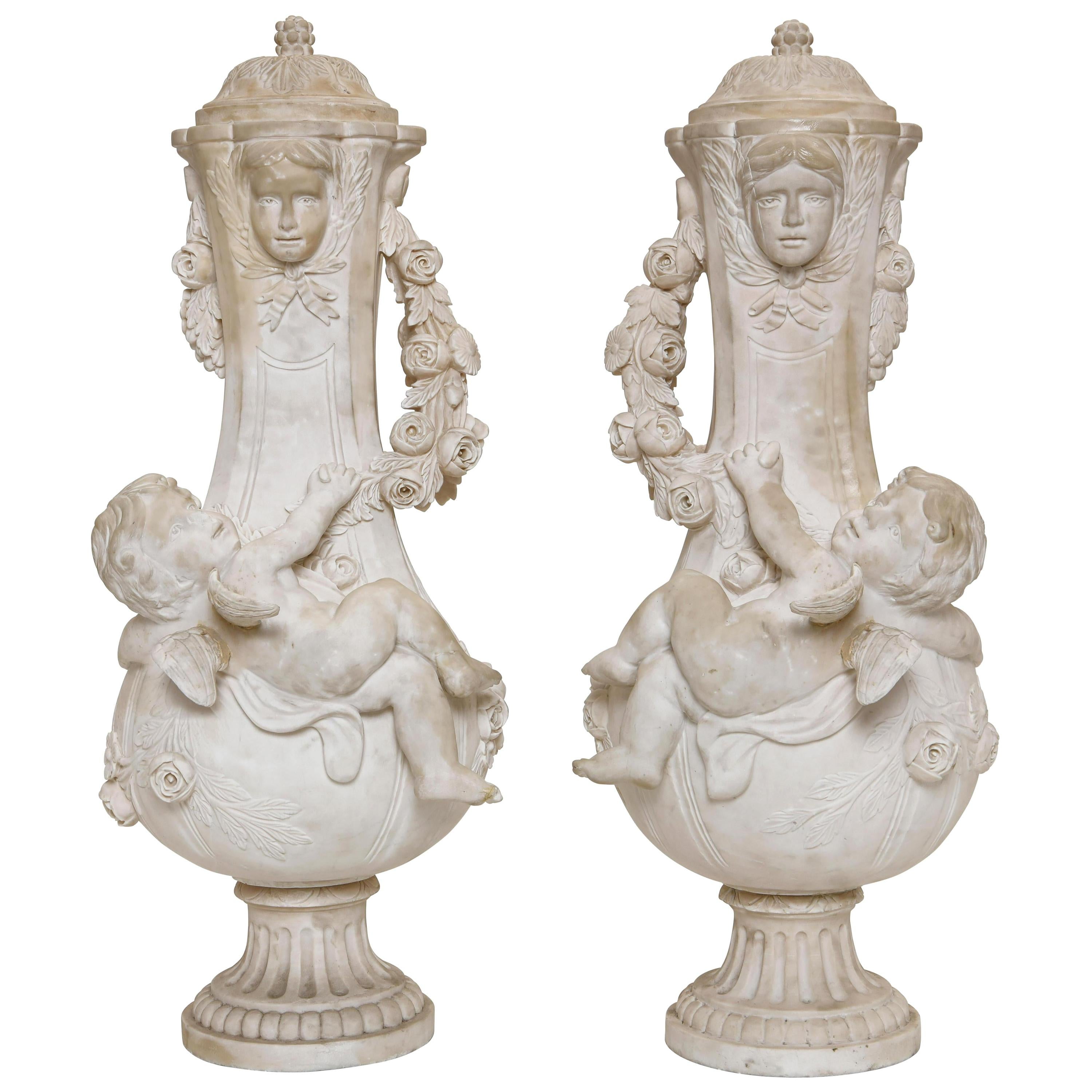 Pair of Marble Urns with Cherubs, Signed A. Moreau