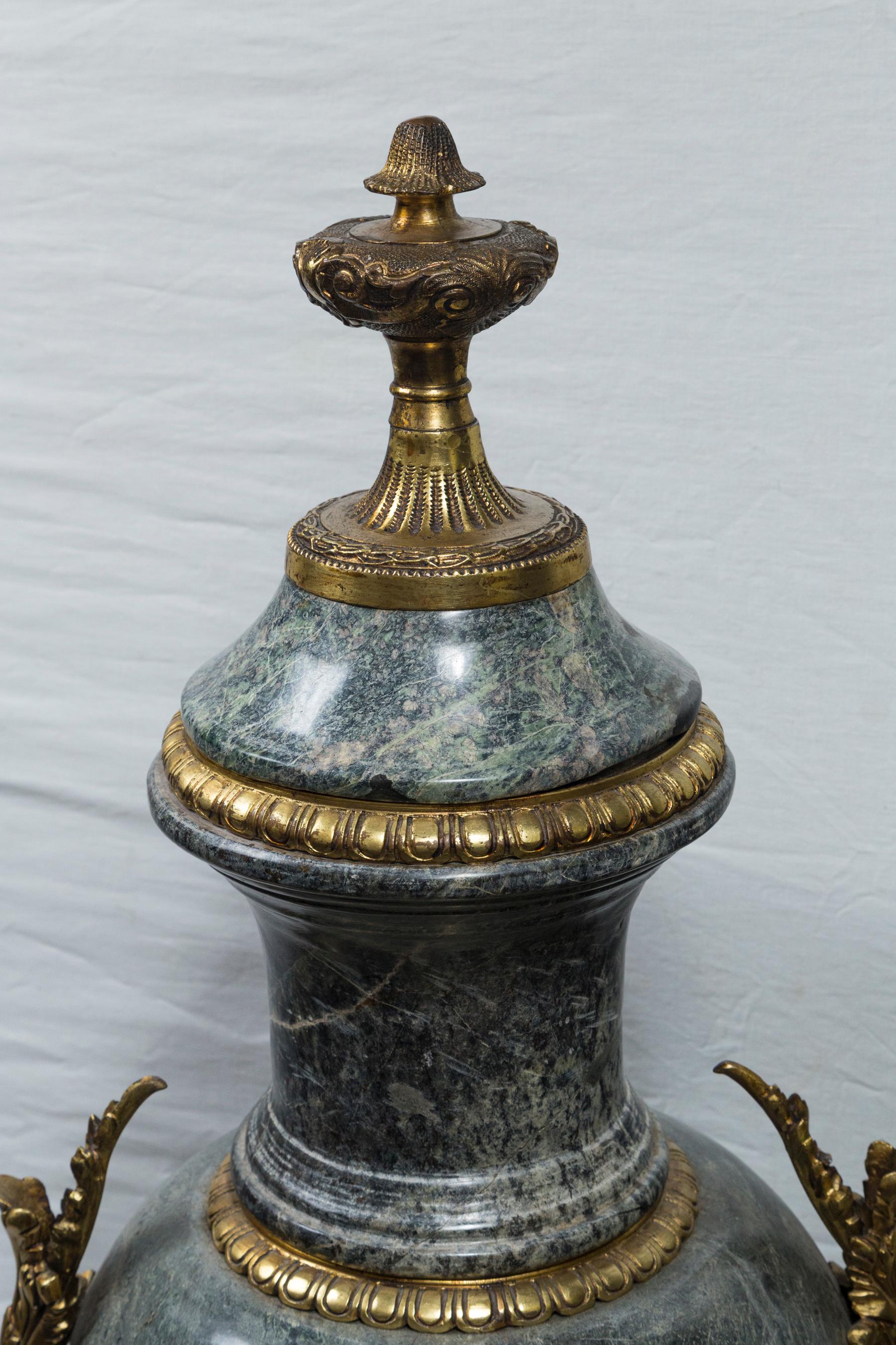 Cast Pair of Marble Urns with Gilt Bronze Mounts For Sale
