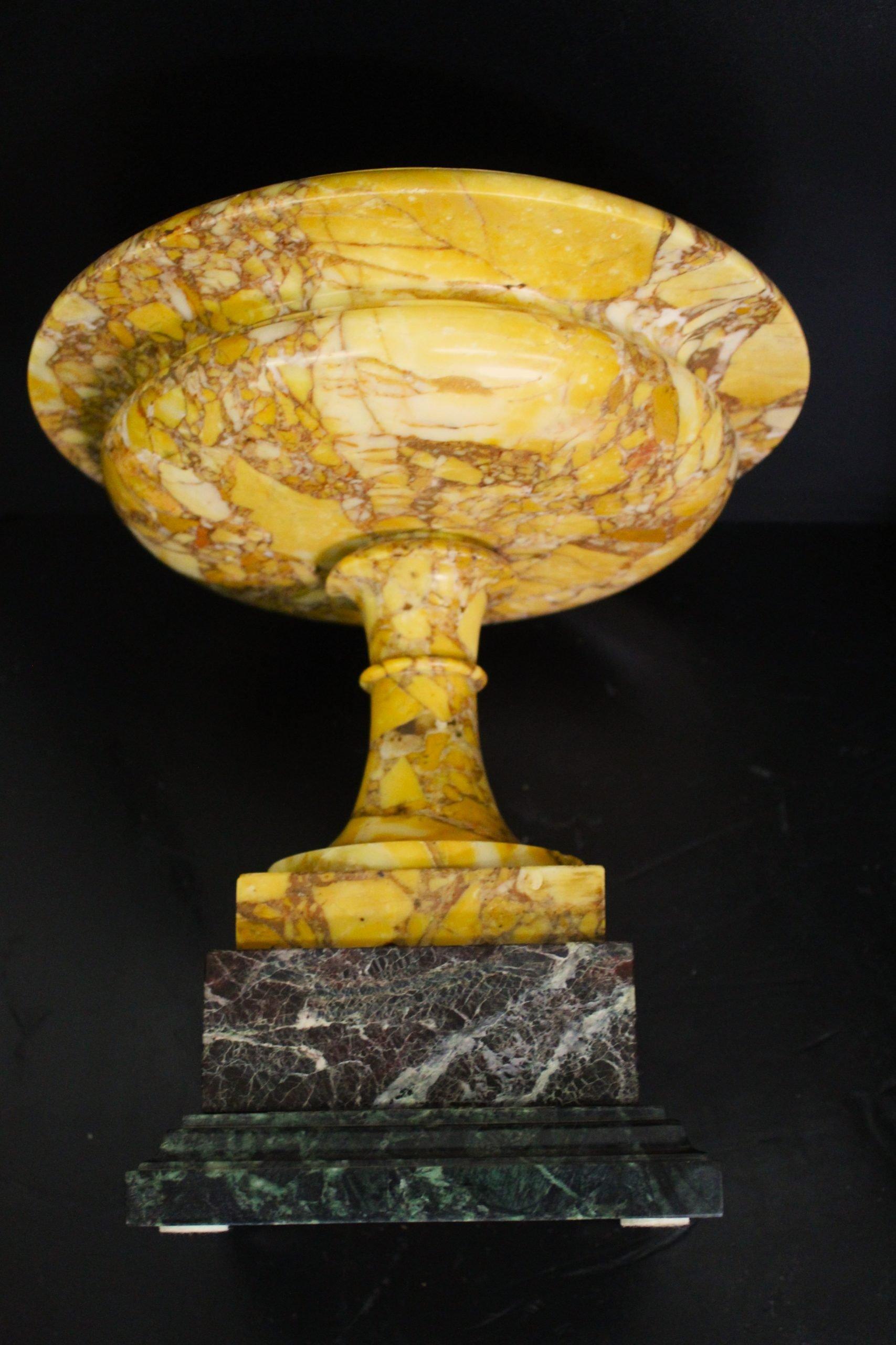 Pair of vases in marble yellow breccia and base in marble rosso levante. XX Century.