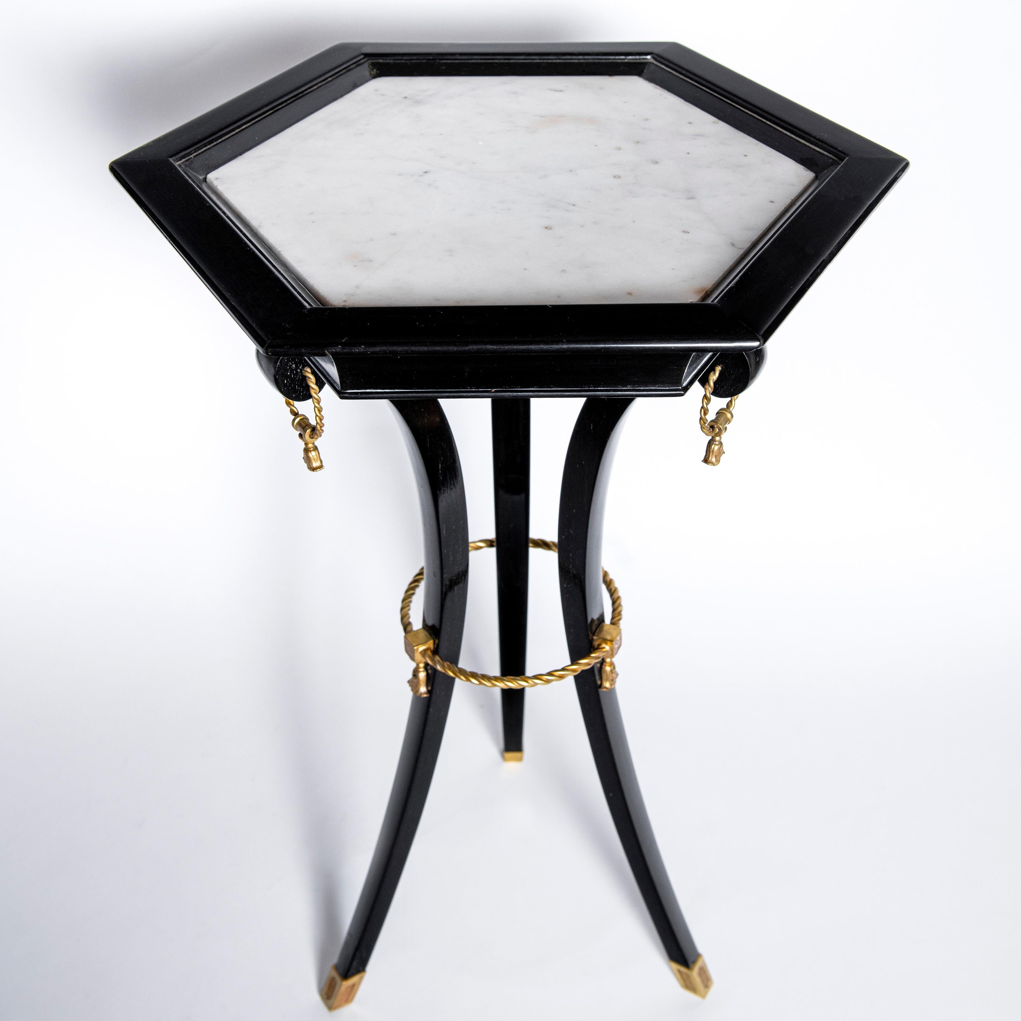 Pair of marble, wood and gilt bronze side tables, France, circa 1950.
Attributed to Maison Jansen.