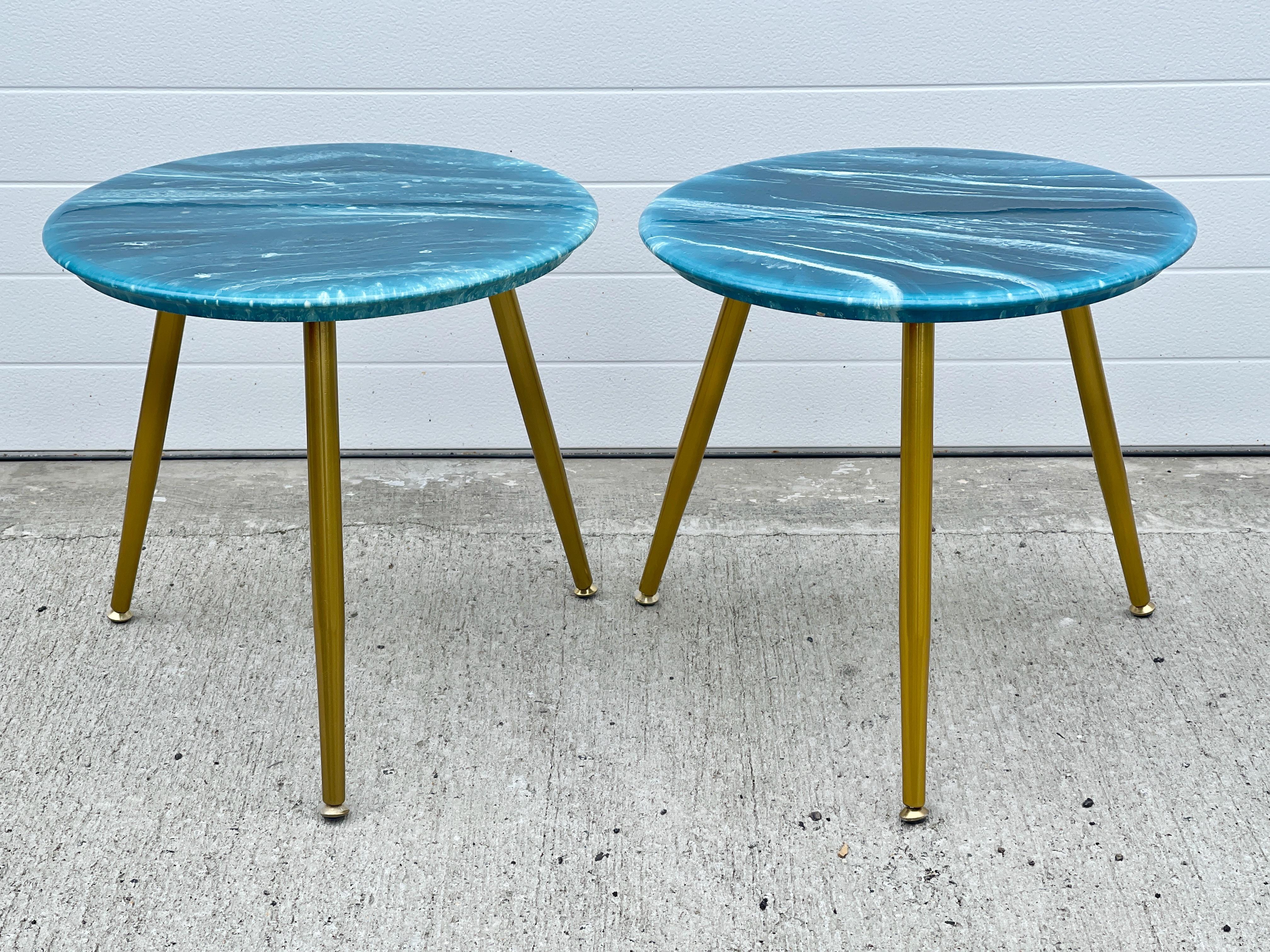 Pair of round three legged round top side tables consisting of an 18 inch diameter 