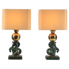 Pair of Marcel Asselbur ceramic table lamp with horse decoration