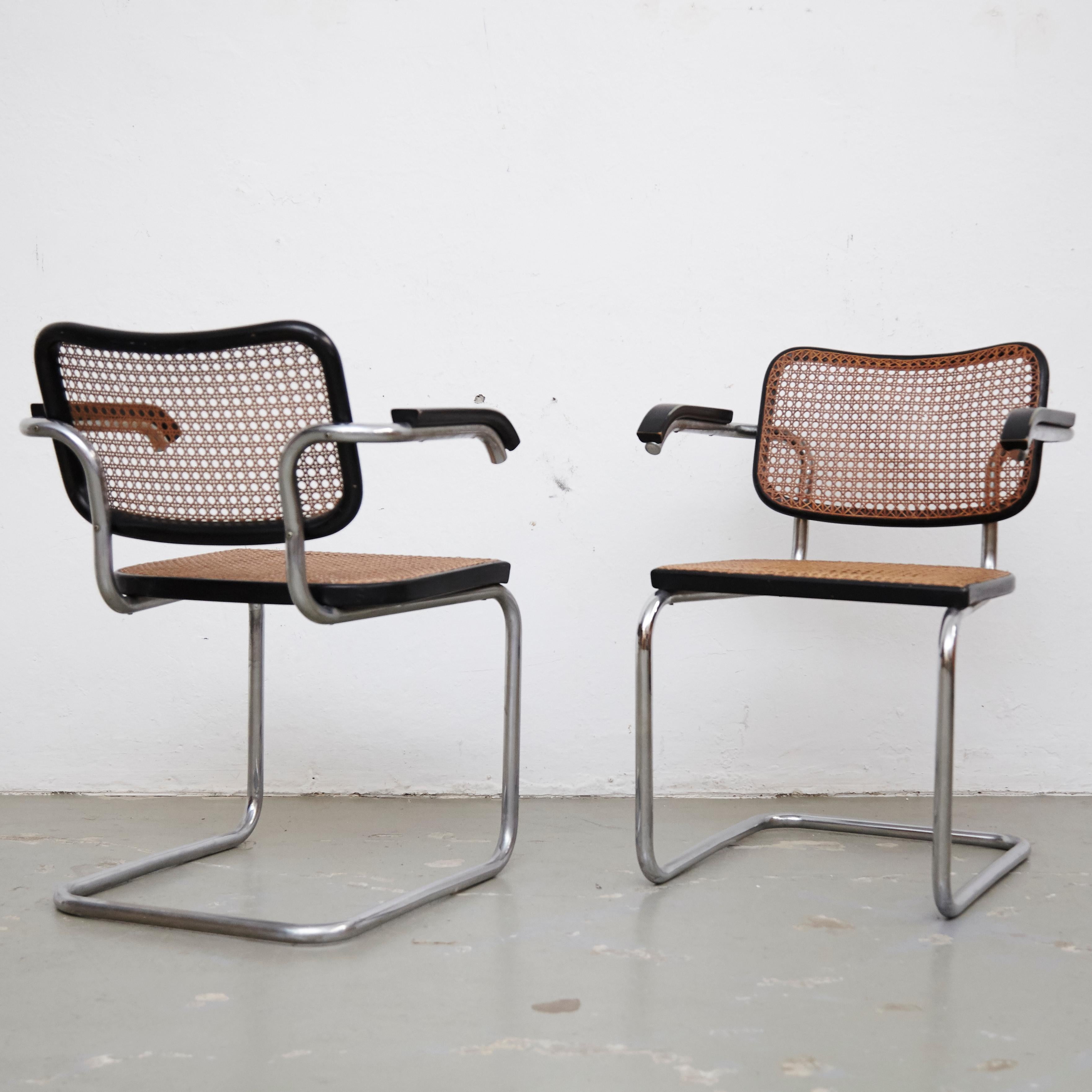 Chairs, model Cesca, designed by Marcel Breuer.
Manufactured in Italy around 1960 by Gavina manufacturer.

Metal pipe frame, wood seat and back structure and rattan.

In good original condition, with minor wear consistent with age and use,
