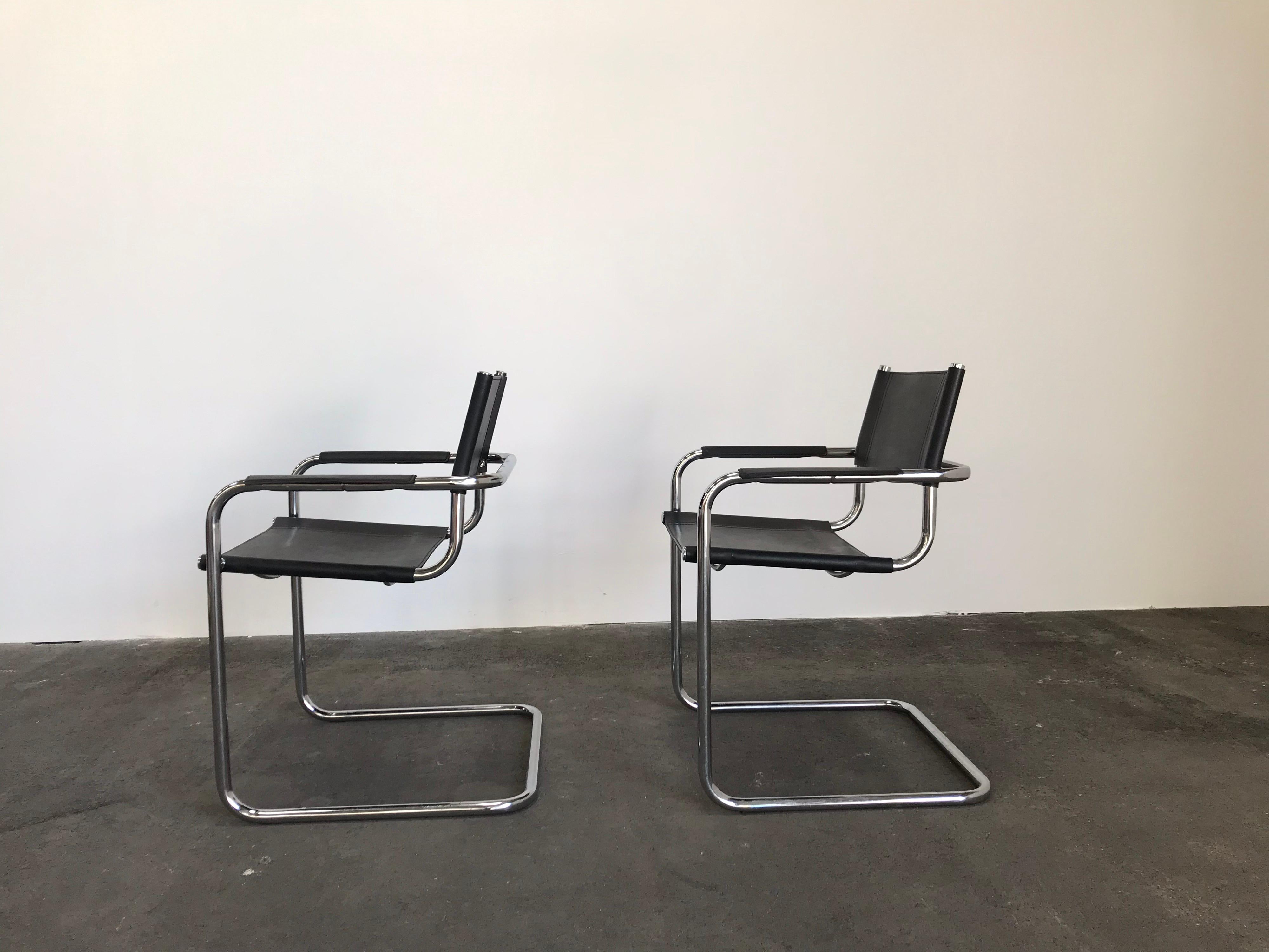 Iconic Bauhaus design by Marcel Breuer. These dining chairs are cantilevered tube steel with black leather seat, backrest and armrest covers.

Model B34 / MG5 by Matteo Grassi / Thonet.