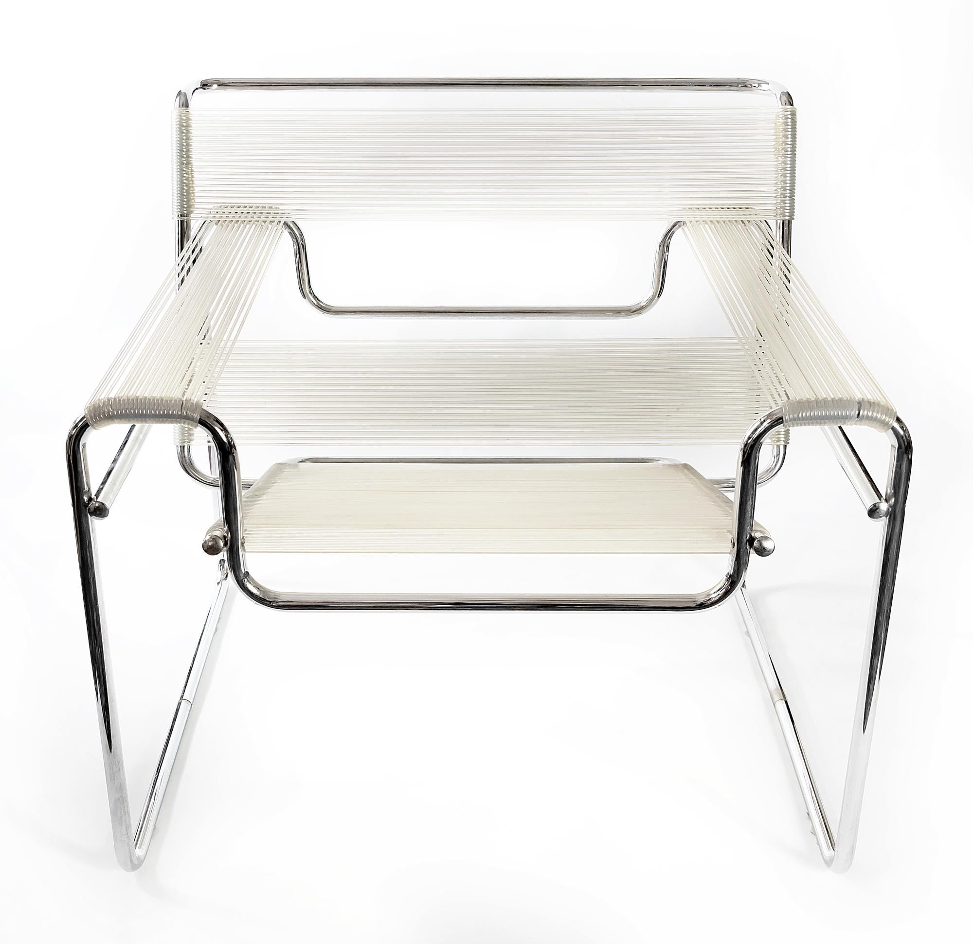 Pair of Wassily style chairs, designed by Marcel Breuer, circa 1925.
Manufactured circa 1980s, clear silicone rope, chromed steel tube frame.


   