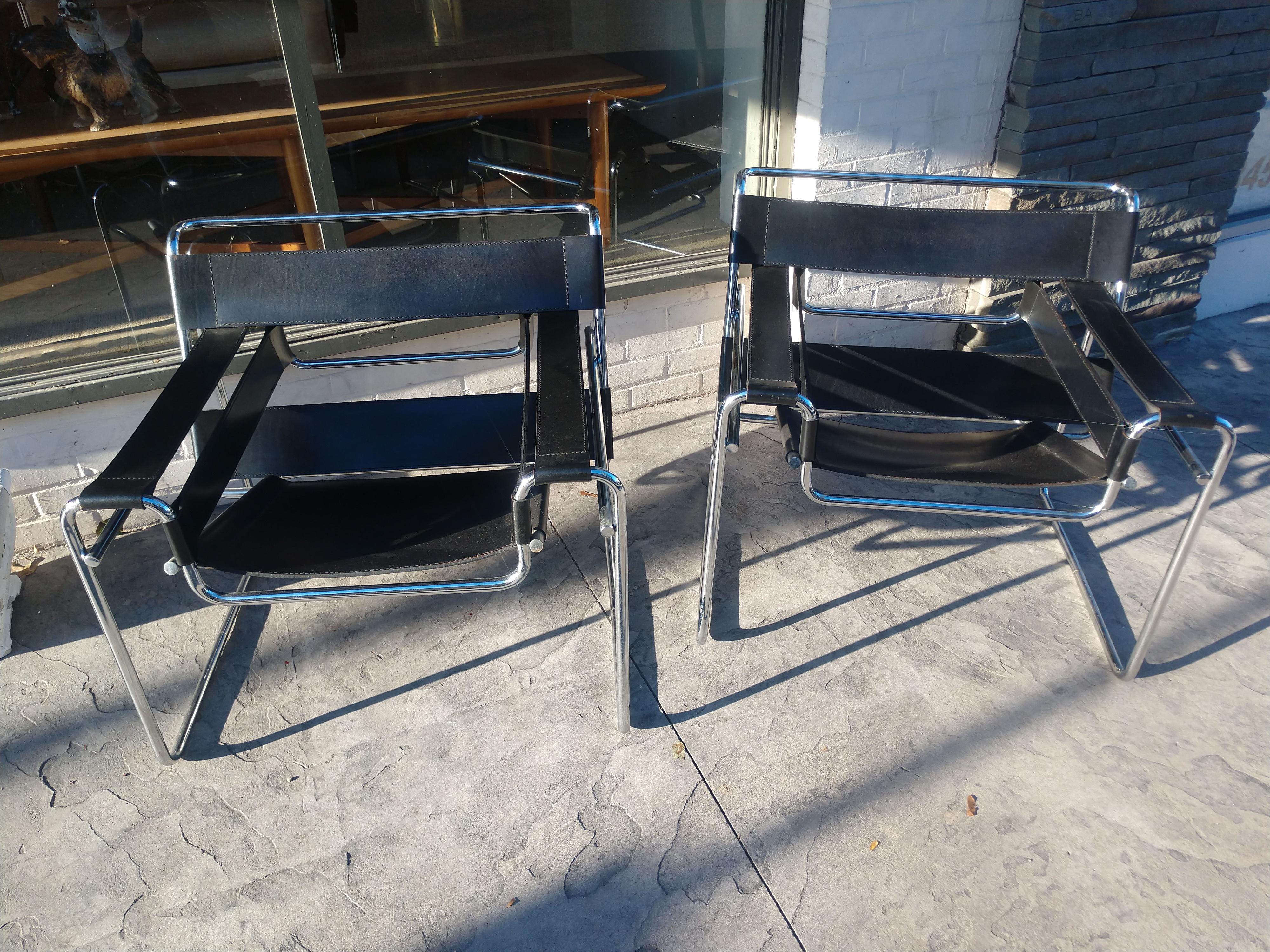 Fabulous pair of Mid-Century Modern early Wassily chairs by either Knoll or Stendig. High quality leather and chrome tubing in excellent vintage condition with minimal wear. Marcel Breuers timeless Classic epitomizes the Bauhaus era. This chair is