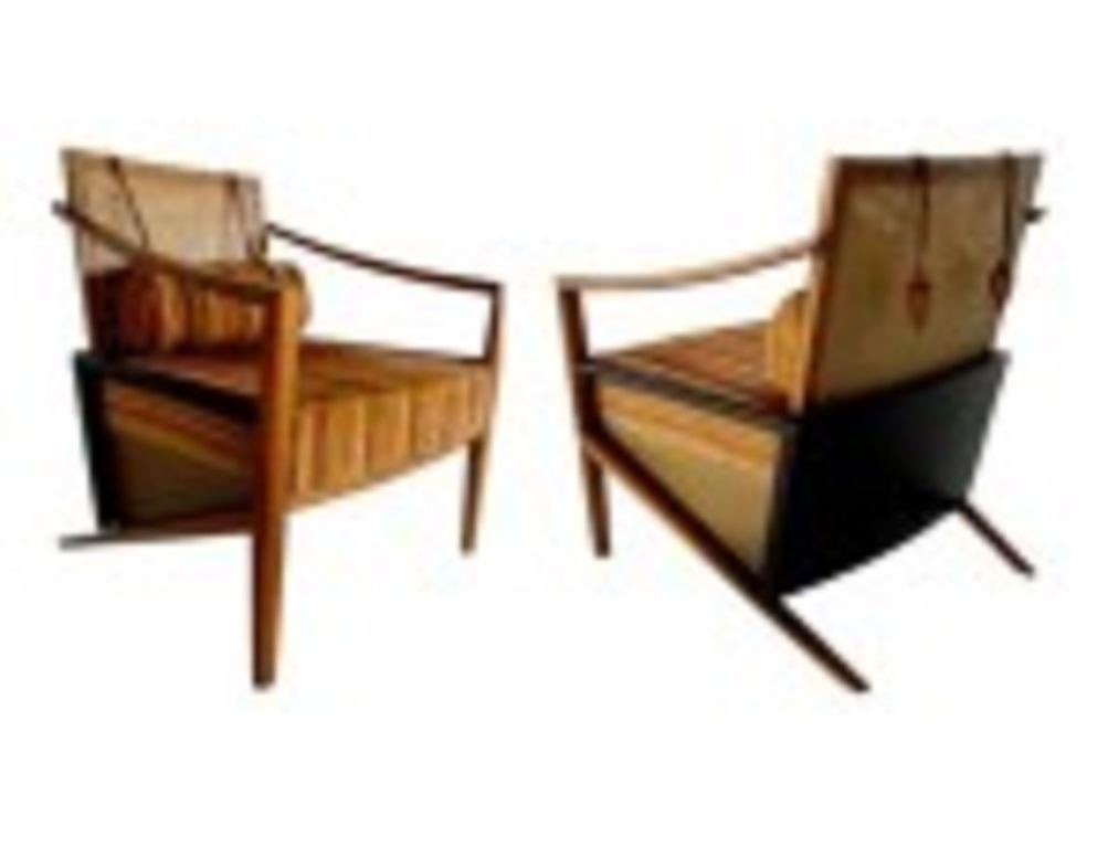 COPPIA di poltrone moderne brasiliane con struttura in legno di noce ed ebanizzato, pannelli a canne e cuscini imbottiti a righe. (MARCELO MANHAGO PER PARMA) (PREZZO A COPPIA)

Condit: Buono; Usura coerente con l'età e l'utilizzo