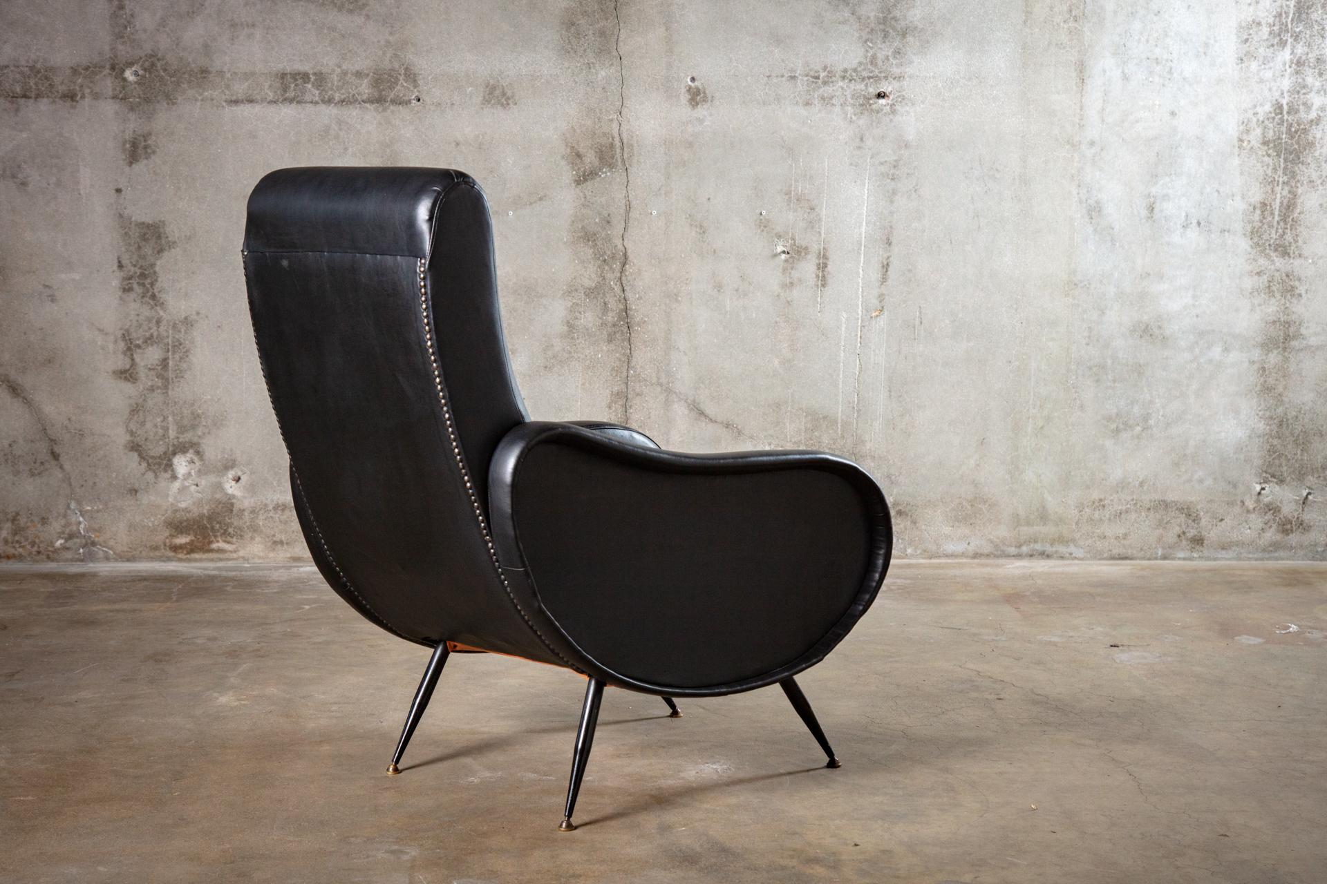 Pair of Marco Zanuso club chairs with iron upholstered in black leather, circa 1950.