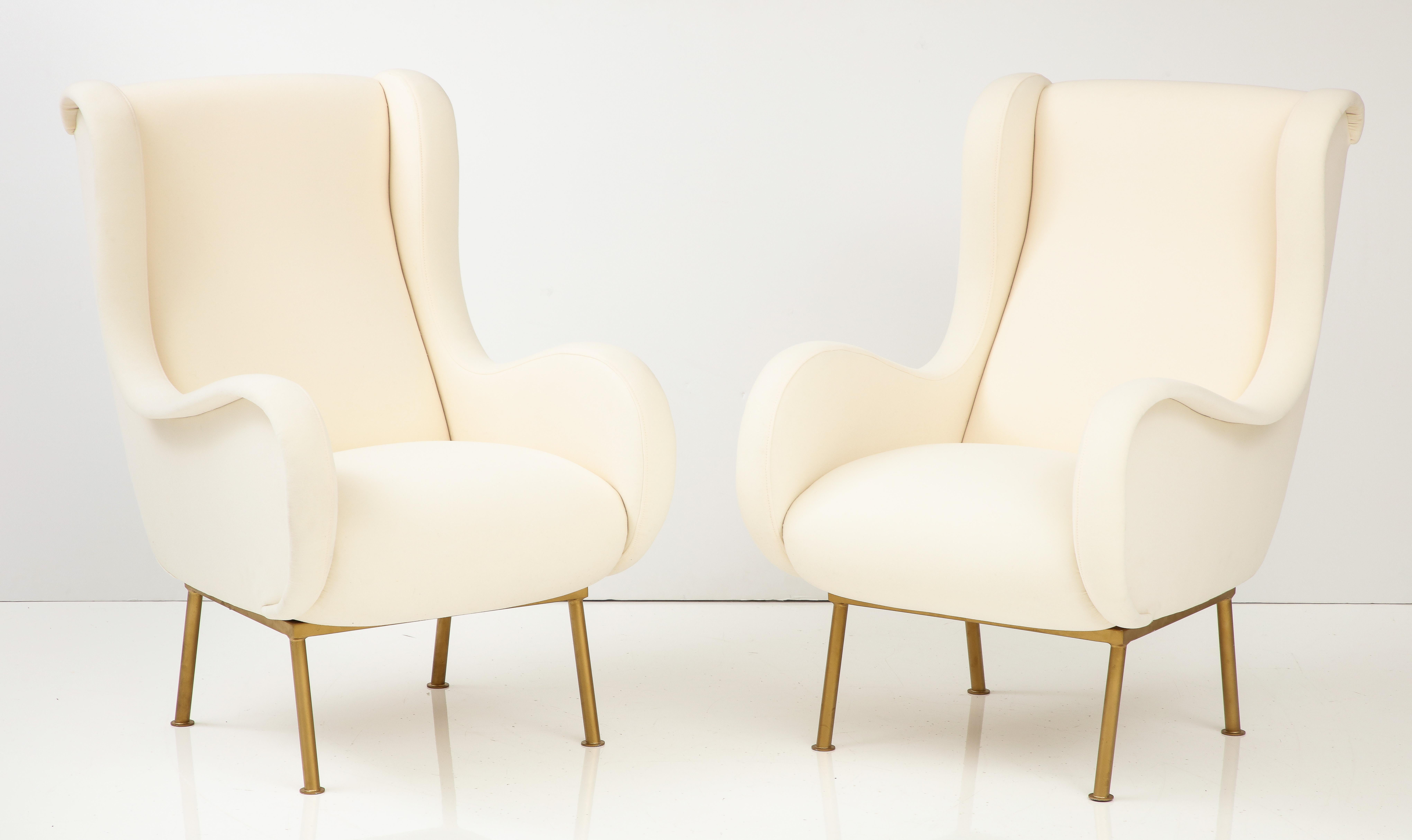 A pair of the iconic 'Senior' lounge chairs, designed by Marco Zanuso and manufactured by Arflex, in Italy, 1951. This pair have been fully restored and newly upholstered in our professional studio in a creamy white Pindler fabric. The curvaceous