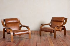 Pareja de sillones de cuero Marco Zanuso