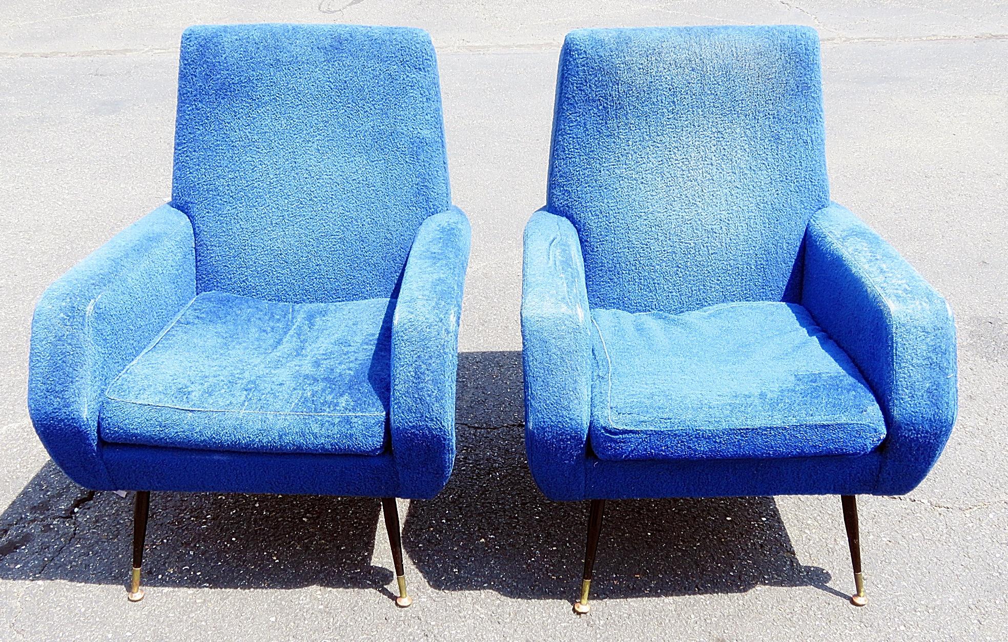 Pair of Marco Zanuso style lounge chairs with metal legs and brass sabots.