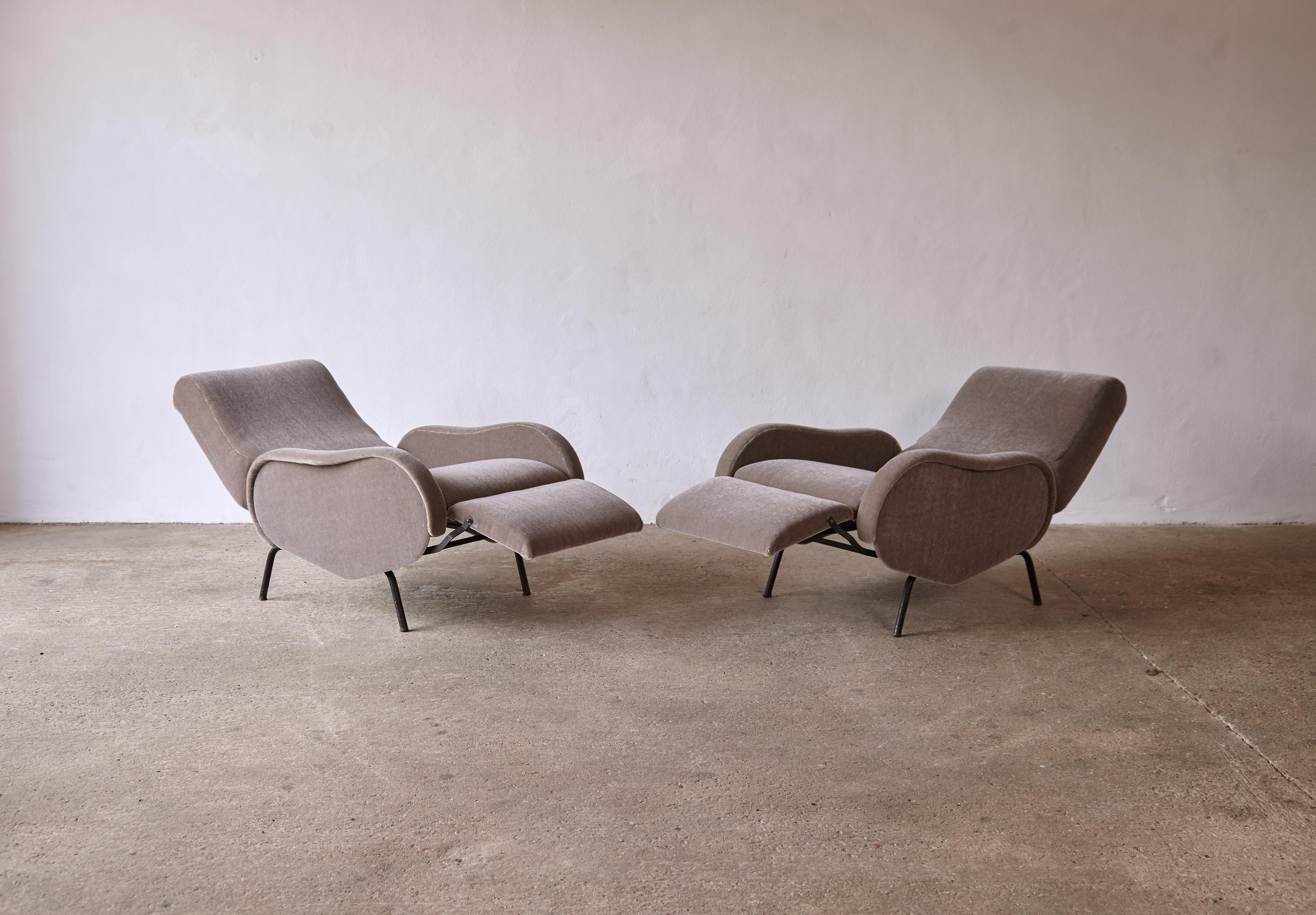 A pair of Marco Zanuso style reclining lady chairs, Italy, 1960s. Newly reupholstered in grey (with a hint of brown) 100% mohair fabric. The recline function works well and the chairs are ready to use. Length when fully reclined 152cm. Ships