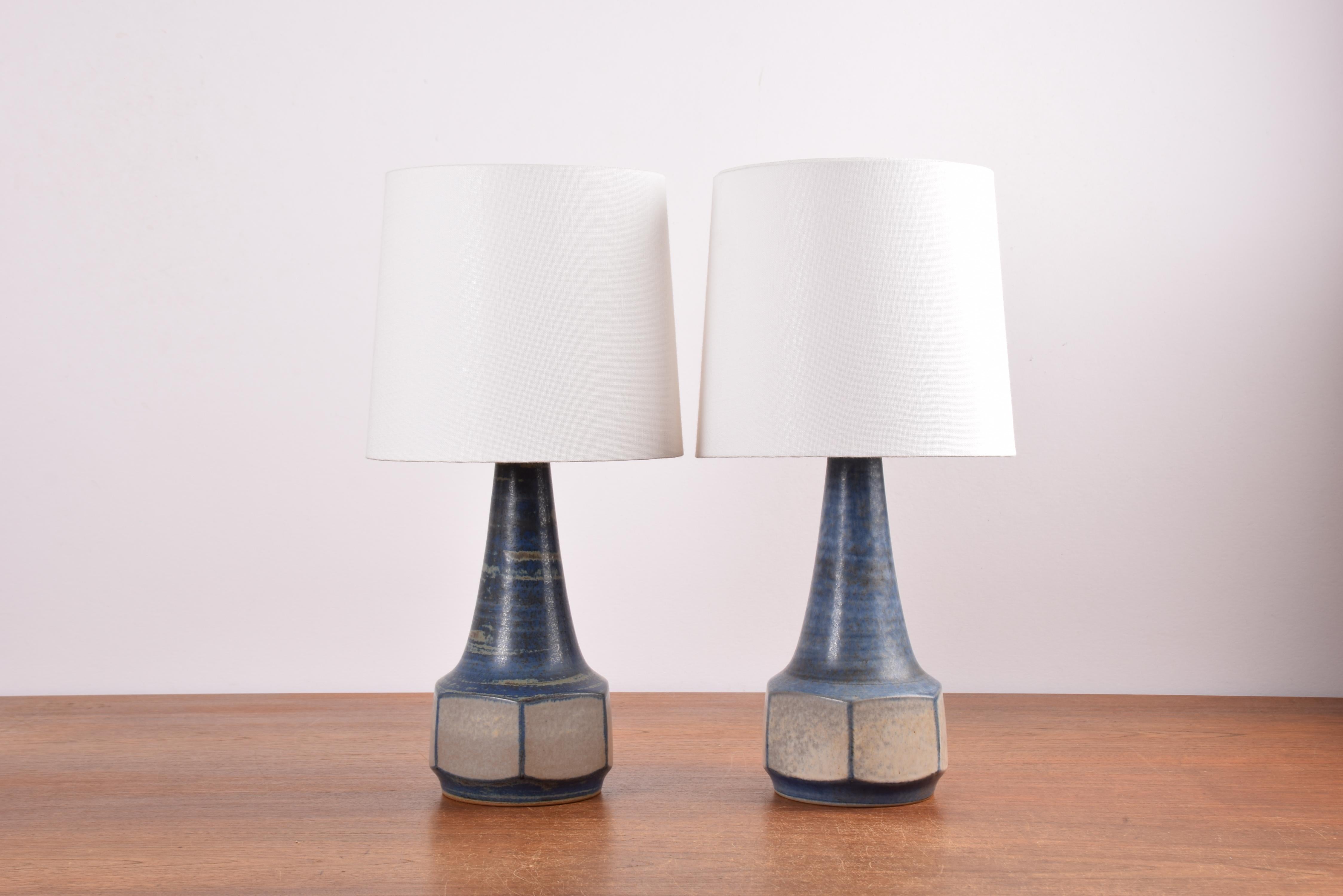 Pair of table lamps designed by Marianne Starck for Michael Andersen. Made circa 1960s or 1970s.
The lamps are made from stoneware and have a matte blue and gray glaze with some beige elements.
Due to the firing process the glaze has a unique