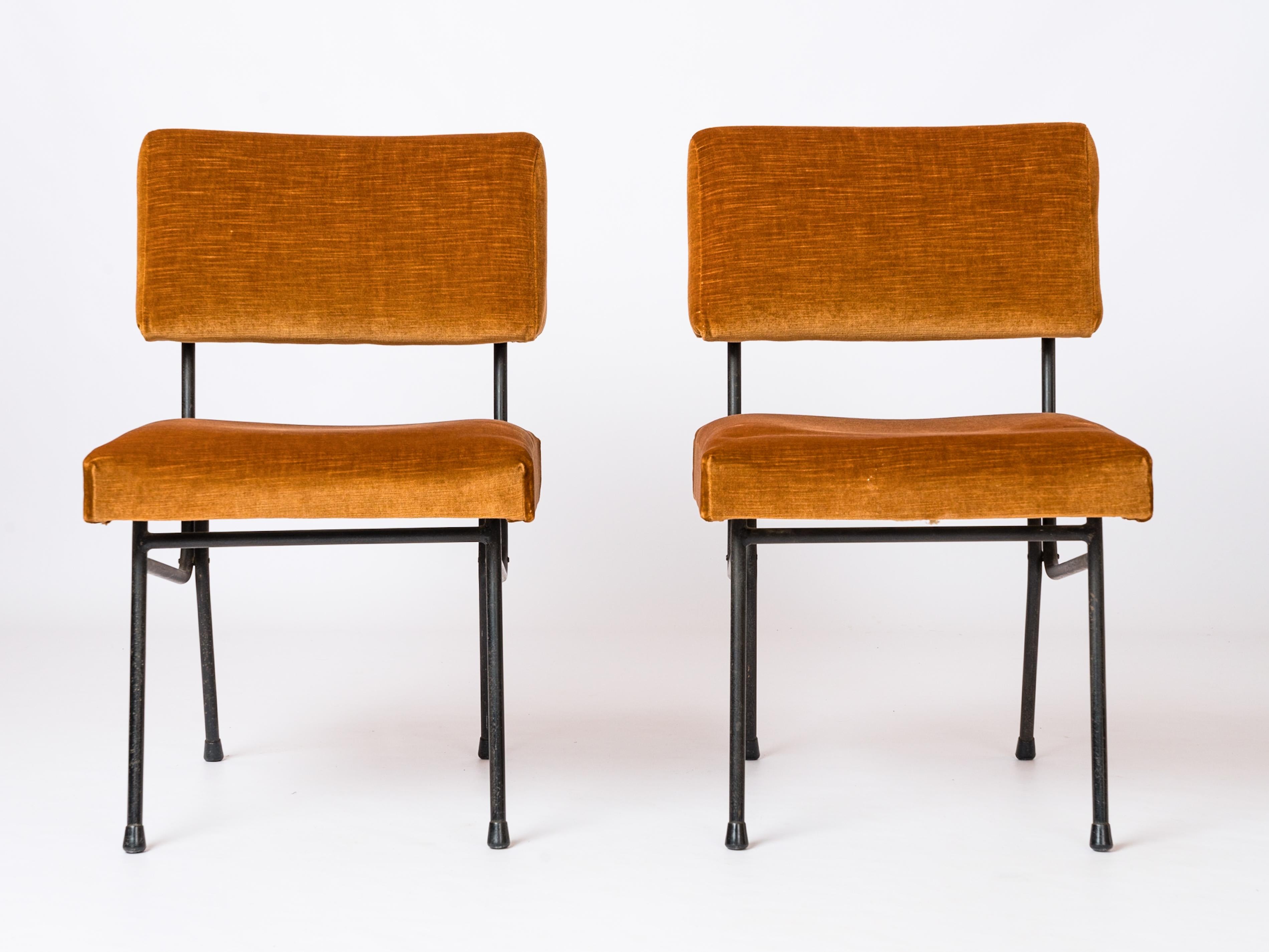 Pair of minimalist adjustable chairs featuring a black lacquered steel structure and original marigold upholstery. As shown on picture 6, the chairs are adjustable for depth, height and seat height and can be switched to a more loungy position.
COM