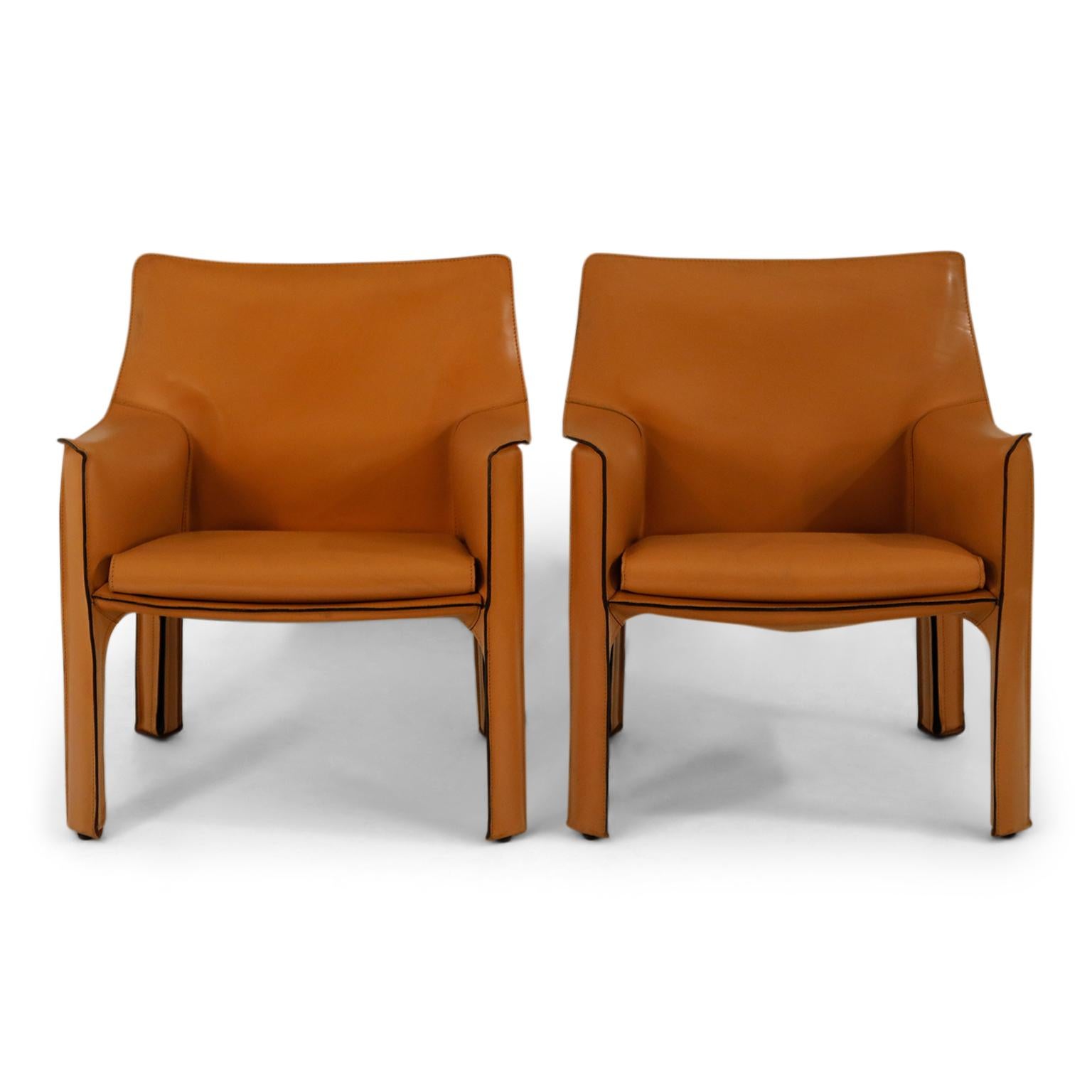 Note: This listing is for a pair of chairs. We accidentally submitted it as a single in the description and now cannot be edited but it is for a pair of chairs, not for a single. 

A beautiful pair of Mario Bellini Cab lounge chairs in exemplary