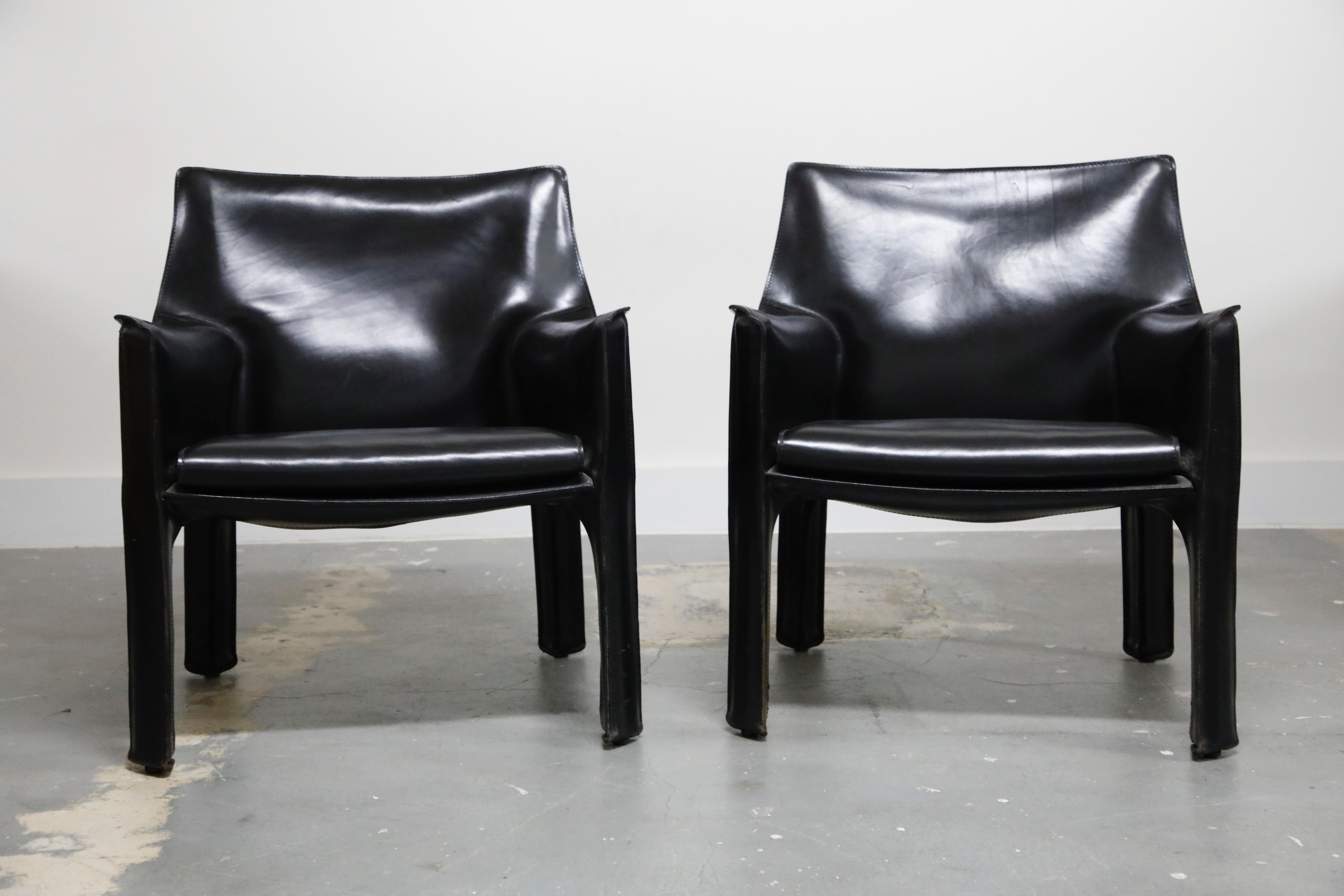 A beautiful pair of Mario Bellini Cab lounge chairs, Model #414, in exemplary condition, signed Cassina, designed in the 1970s. These fine examples of the cab line by Mario Bellini for Cassina are Classic staples for luxury interior designers and