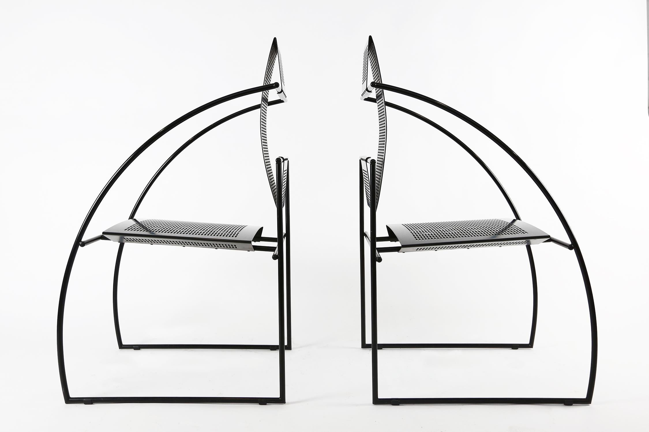 Set of 2 Quinta chairs by the Italian architect Mario Botta for Alias.
The Quinta chair is constructed with steel rod frame and folded perforated sheet metal seat and back, designed in 1985.

A pair available but priced per single chair!
  