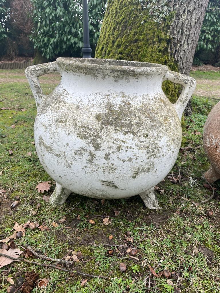 A pair of cement planters by Willy Guhl.