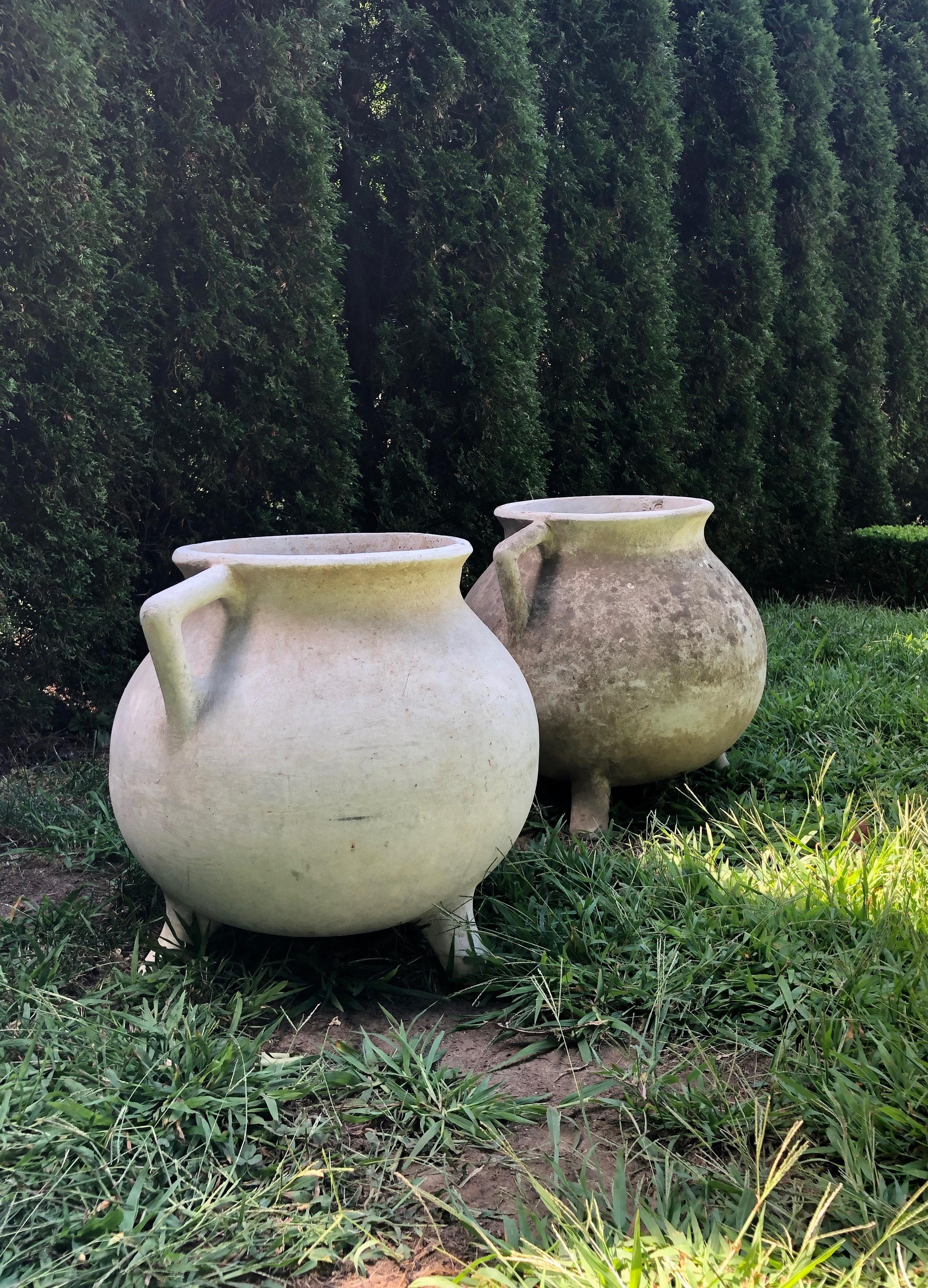 We are huge fans of Willy Guhl garden pieces and these are a pair of “Marmite” planters with different patinas. One has a well-weathered surface, while the other has been painted white in the not-too-distant past. Nonetheless, they would look