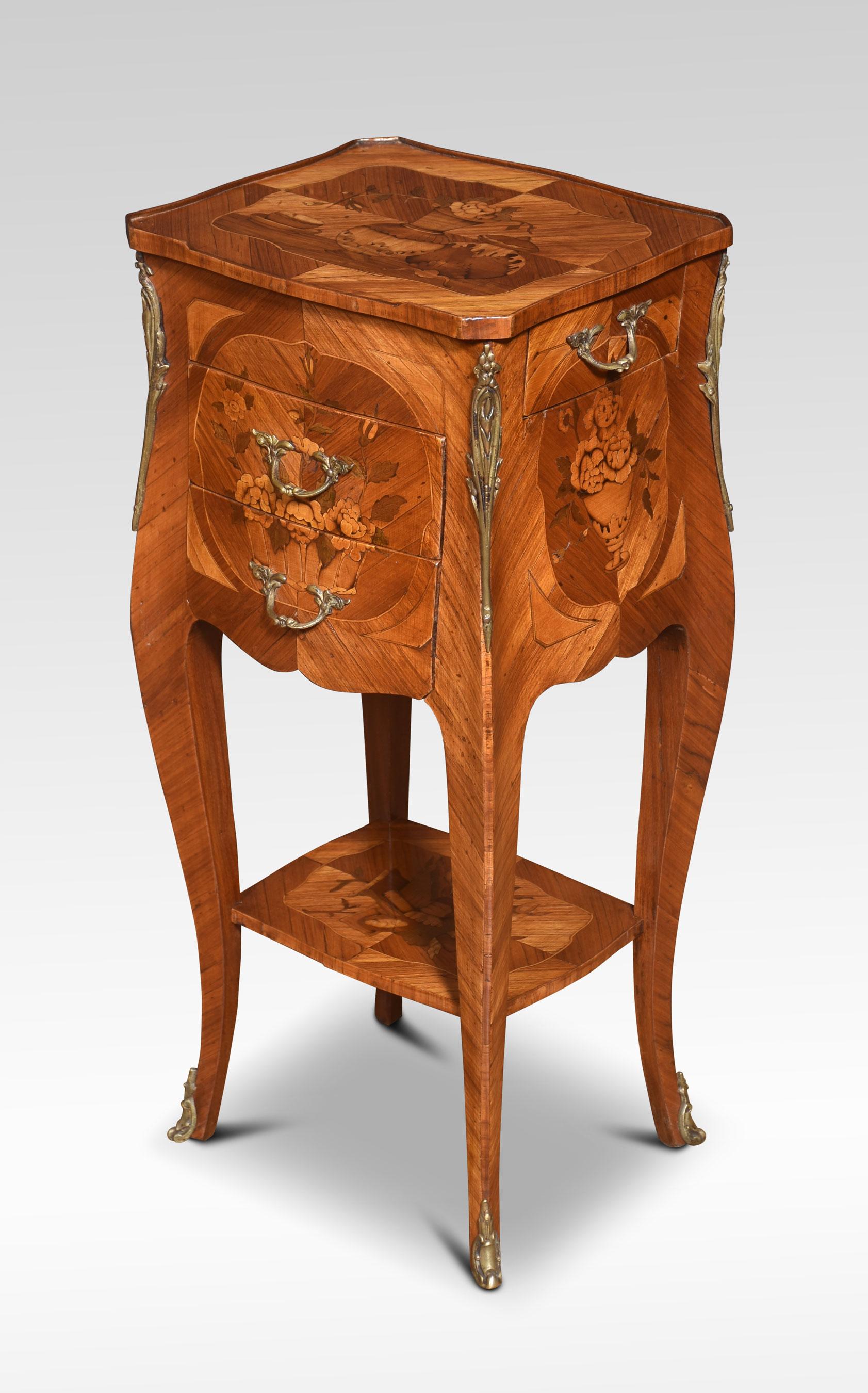 Pair of bedside chests. The marquetry inlaid tops having canted corners above two frieze drawers, and two small side drawers. All raised on slender cabriole legs united by under tier.
Dimensions
Height 27 Inches
Width 12.5 Inches
Depth 11 Inches